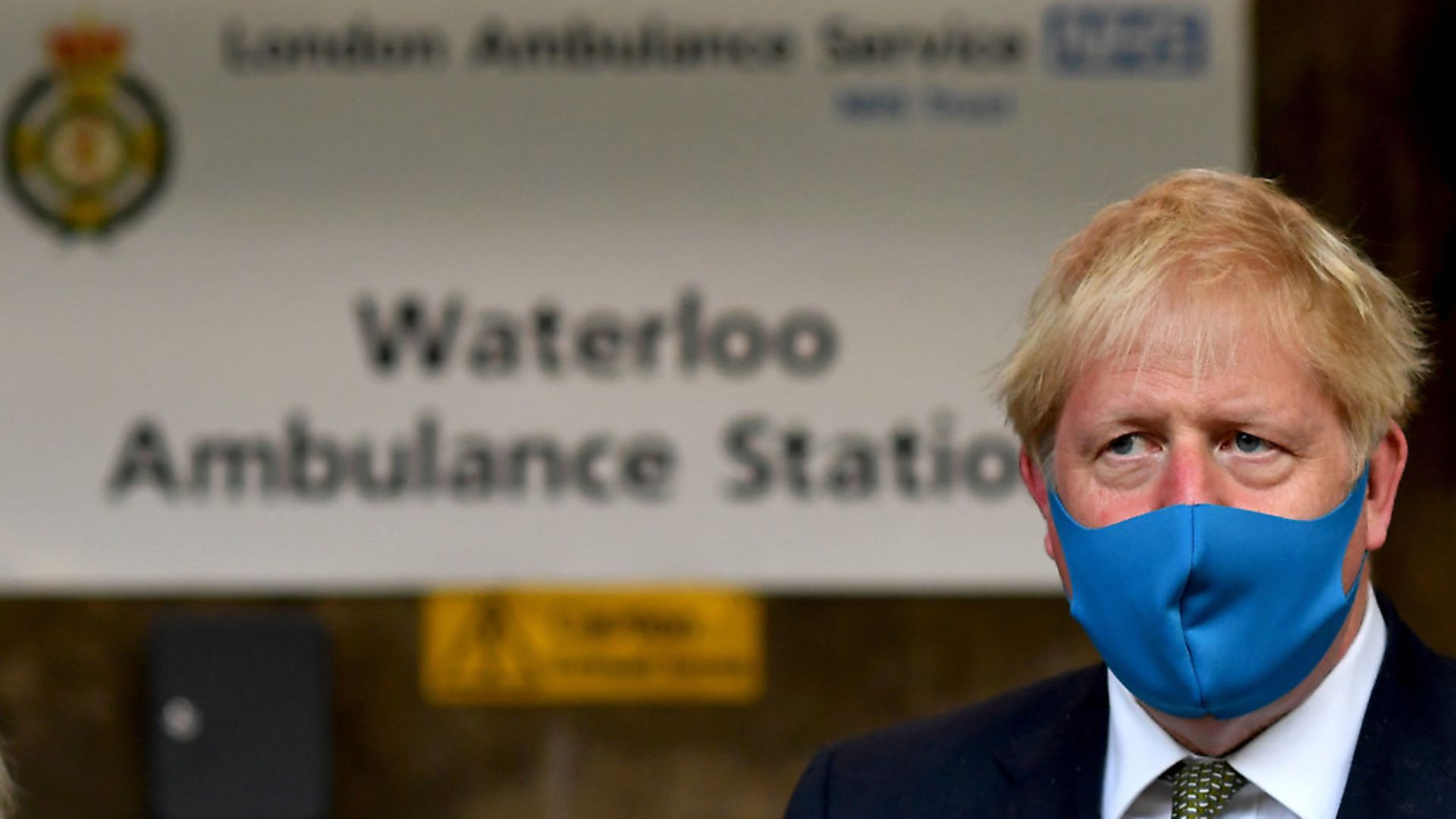 Prime Minister Boris Johnson, wearing a face mask, during a visit to the headquarters of the London Ambulance Service NHS Trust. Photograph: Ben Stansall/PA Wire - Credit: PA