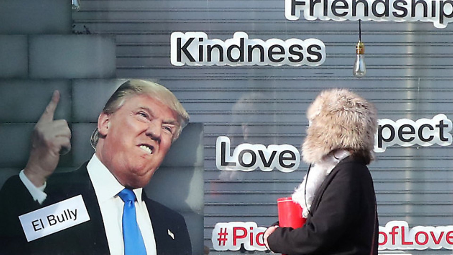 A display depicting Donald Trump as 'El Bully' in the window of a Mexican grocery in Dublin. - Credit: PA Wire/PA Images