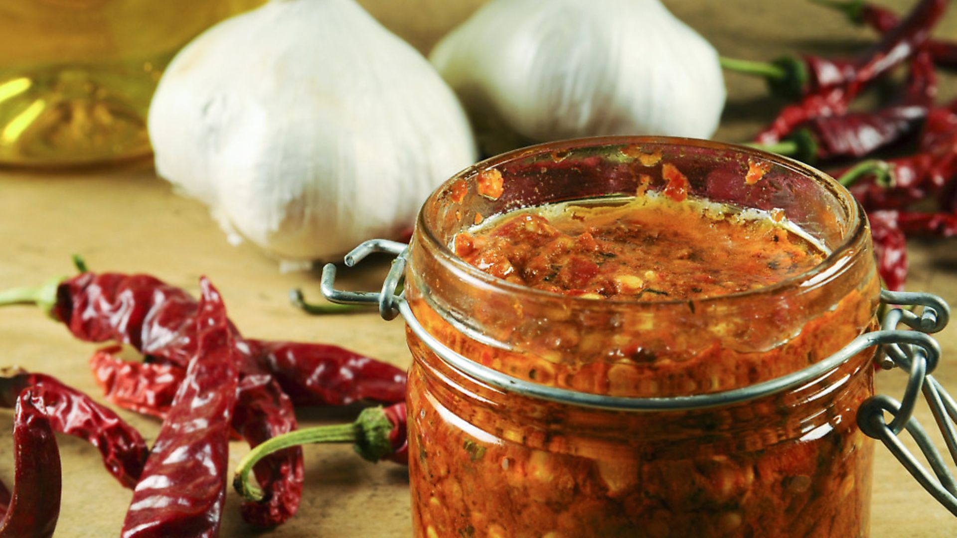 A staple of Mediterranean cuisine, harissa is a blend of garlic, cayenne pepper, olive oil, and herbs and spices - Credit: Getty Images/iStockphoto