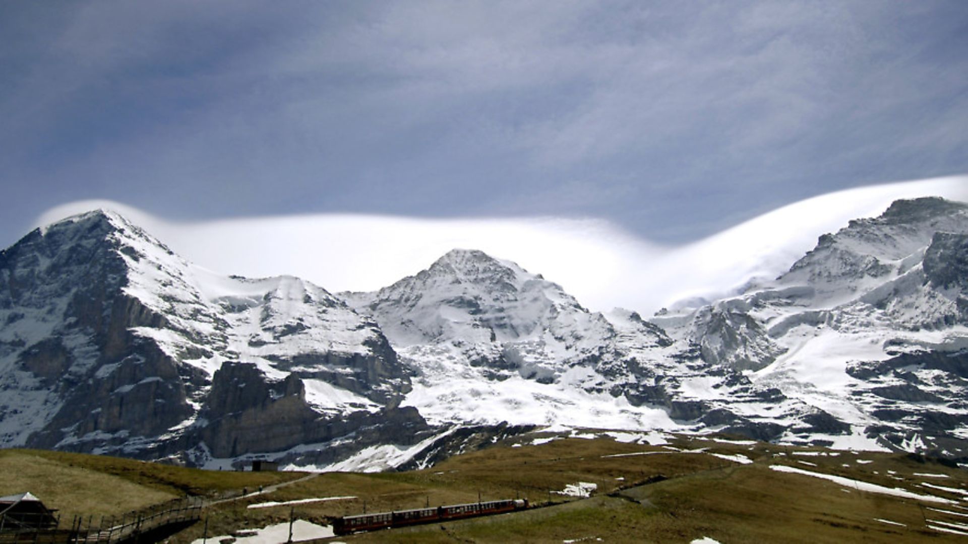 The picture shows the eastern walls of the mountains, from left, Eiger (3,970m), Moench (4,107m) and Jungfrau (4,158m) in Grindelwald, Switzerland. Photo: PA. - Credit: DPA/PA Images