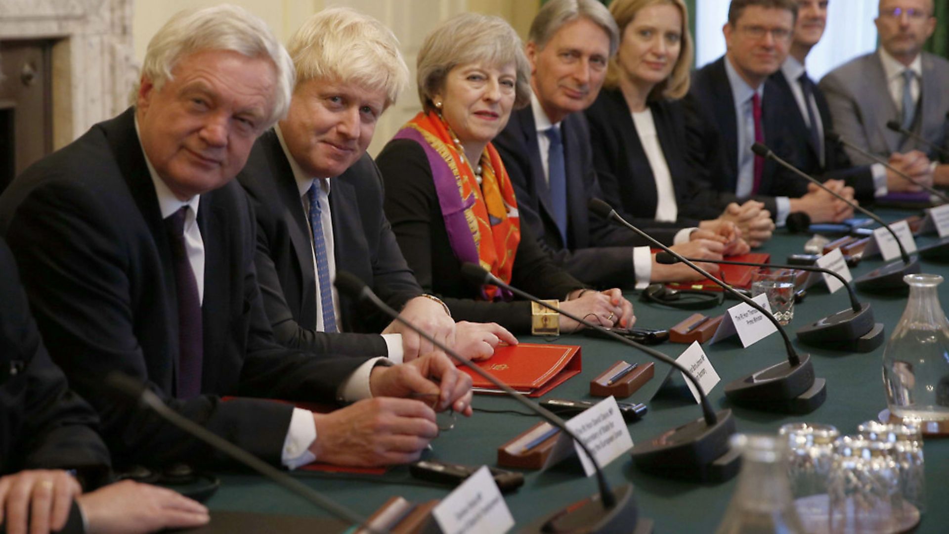 British Prime Minister Theresa May with members of her cabinet (Photo: PETER NICHOLLS/AFP/Getty Images) - Credit: AFP/Getty Images