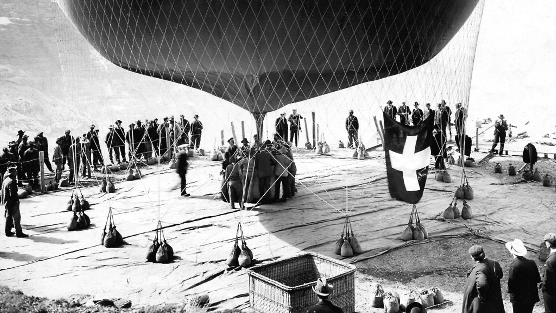 Start of a balloon ride over the Alps, filling a trial balloon, published by Berliner Illustrirte Zeitung. Picture: Eduard Spelterini. - Credit: ullsteinbild / TopFoto