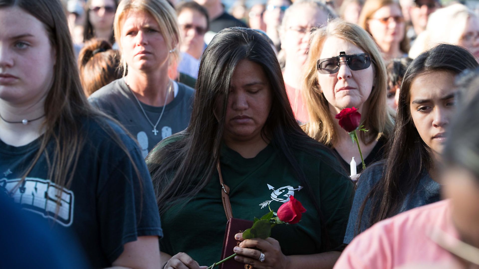 Mourners gather following the shooting that killed 10 at Santa De High School. Picture: PA - Credit: SIPA USA/PA Images