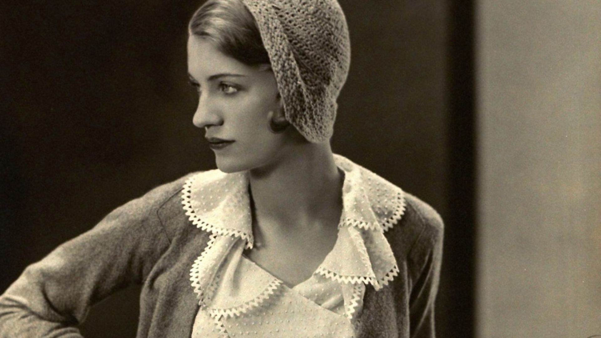 Lee Miller models a  Mirande suit with gloves and crocheted hat. (Photo by�George Hoyningen-Huene/Cond� Nast via Getty Images) - Credit: Cond� Nast via Getty Images