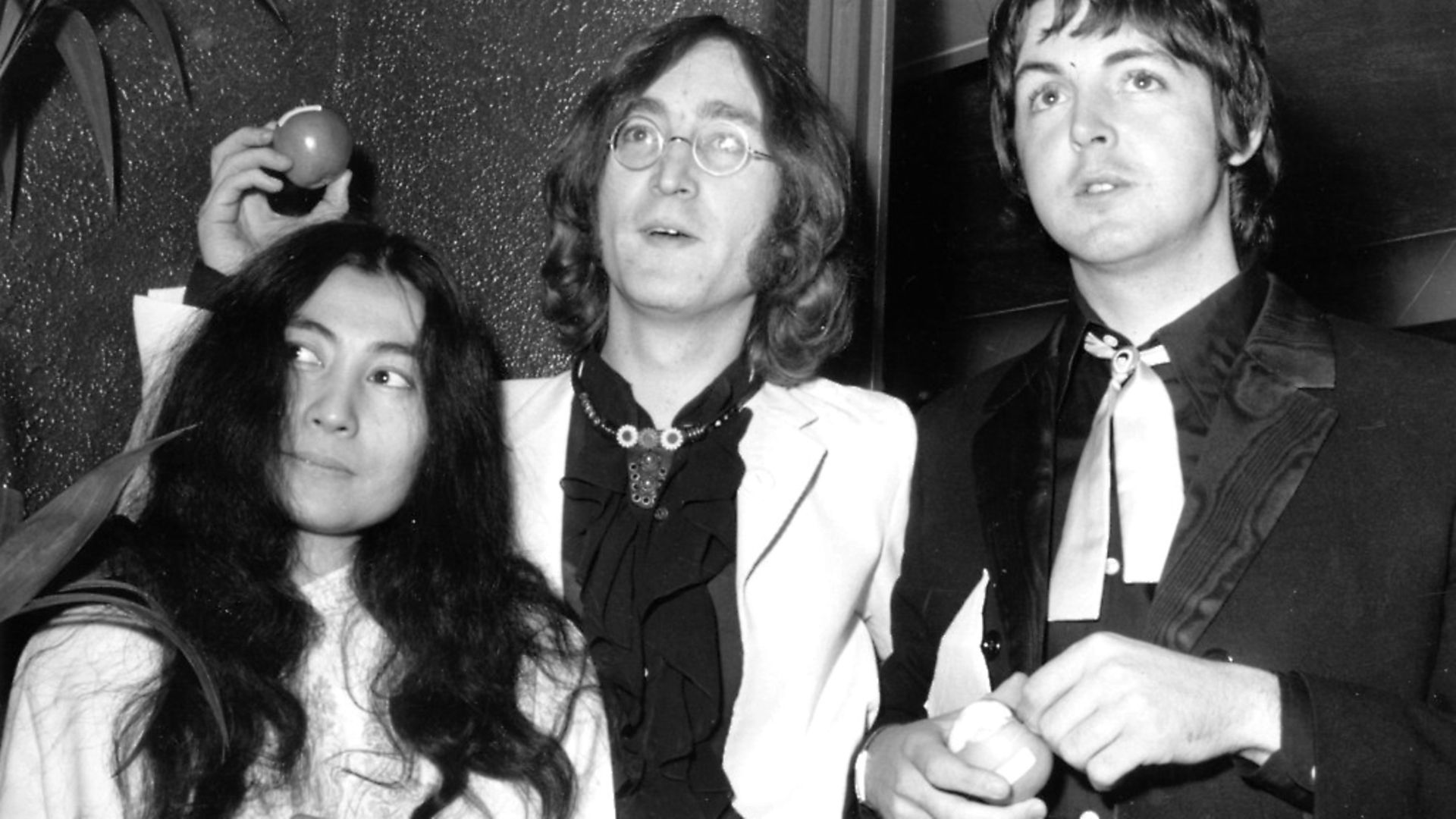 Beatle John Lennon and girlfriend Yoko Ono with Beatle Paul McCartney at the premiere of the new Beatles film 'Yellow Submarine'. Photo: Getty Images - Credit: Getty Images