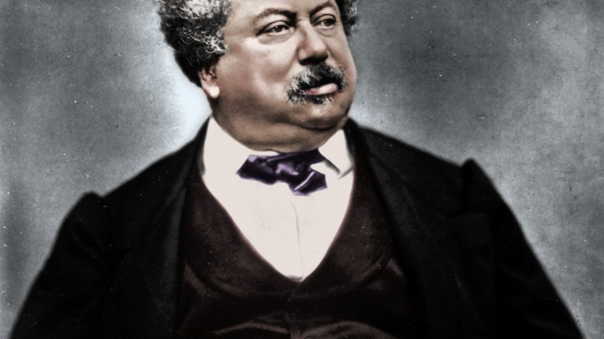 Alexandre Dumas the Elder, French novelist and playwright, c1850-1870. Dumas (1802-1870) was the author of popular historical adventure classics including The Man in the Iron Mask, The Three Musketeers and The Count of Monte Cristo. (Colorised black and white print). Artist Etienne Carjat.. (Photo by The Print Collector/Getty Images) - Credit: Getty Images