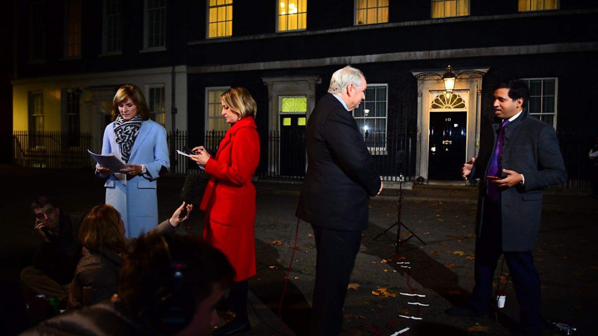 (Left to right) BBC News presenter Fiona Bruce, BBC Political Editor Laura Kuenssberg, Sky News presenter Adam Boulton and Sky News Political Editor Faisal Islam report from Downing Street, London. Photograph: Victoria Jones/PA. - Credit: PA Wire/PA Images