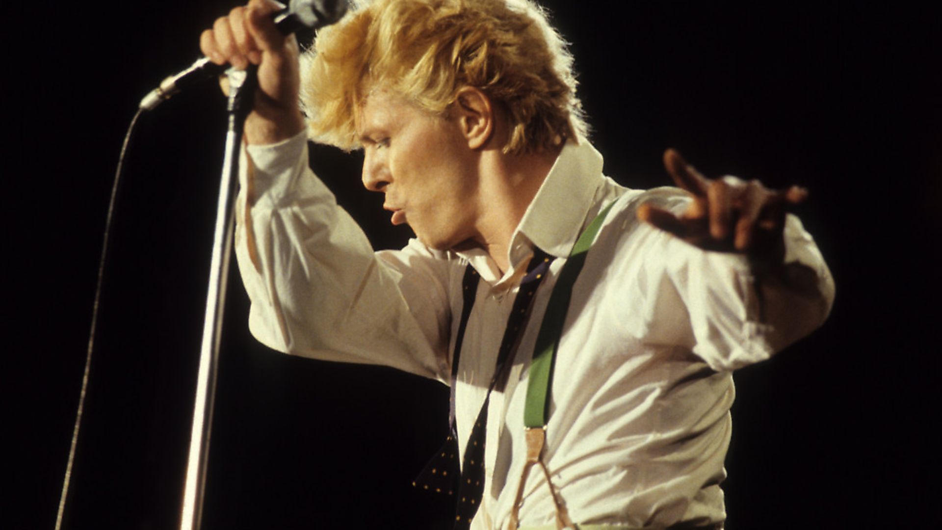 David Bowie performs on stage on the Serious Moonlight Tour at Feijenoord Stadion, de Kuip, Rotterdam, Netherlands, 25th June 1983. (Photo by Rob Verhorst/Redferns) - Credit: Redferns