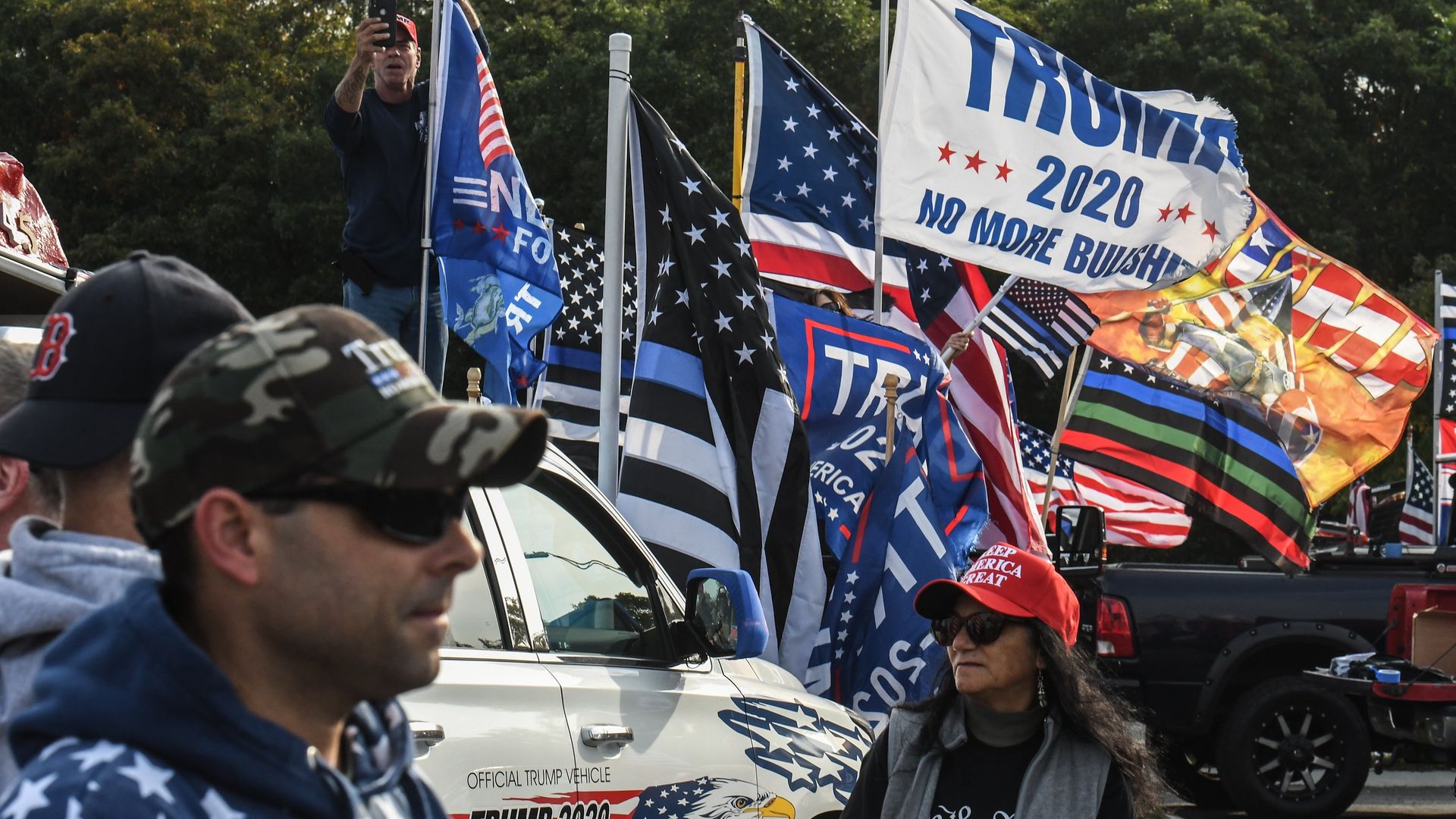 People participate in a pro-Trump rally on October 11, 2020 in Ronkonkoma, New York.  (Photo by Stephanie Keith/Getty Images) - Credit: Getty Images