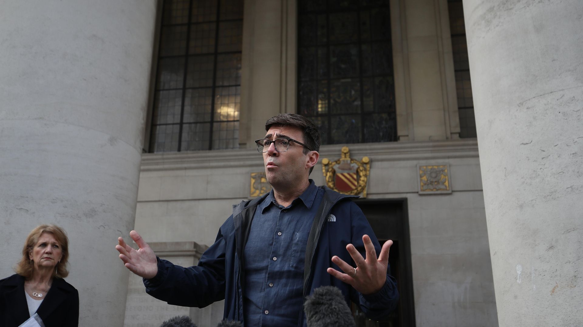 Greater Manchester mayor Andy Burnham speaking to the media outside the Central Library in Manchester, he has threatened legal action if Tier 3 restrictions are imposed without agreement. - Credit: PA