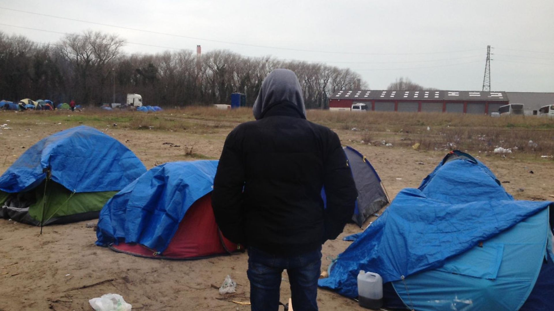 Refugees spending winter in the migrant camp on the outskirts of Calais. Photo: Joe Wallen. - Credit: Archant