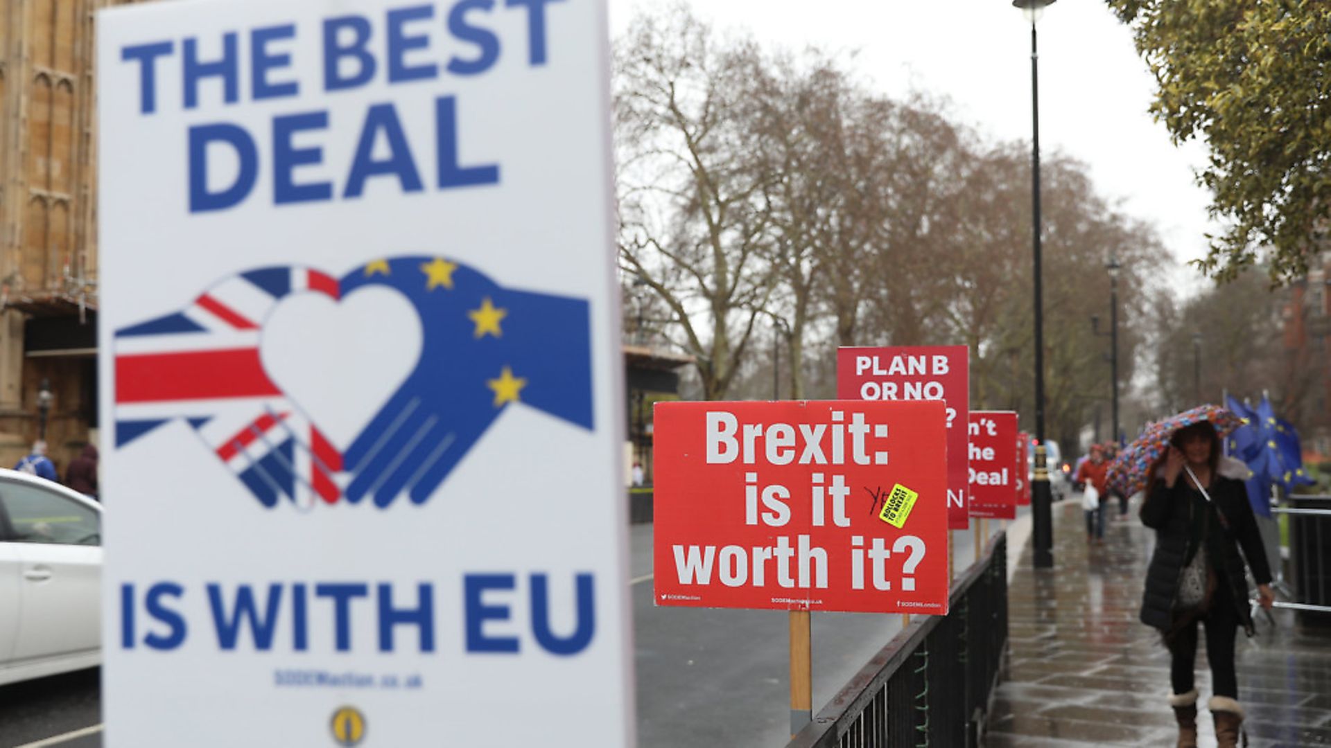 Anti-Brexit placards stand outside the Houses of Parliament as Brexit negotiations continue. Picture: PA/EMPICS Entertainment/Isabel Infantes - Credit: EMPICS Entertainment