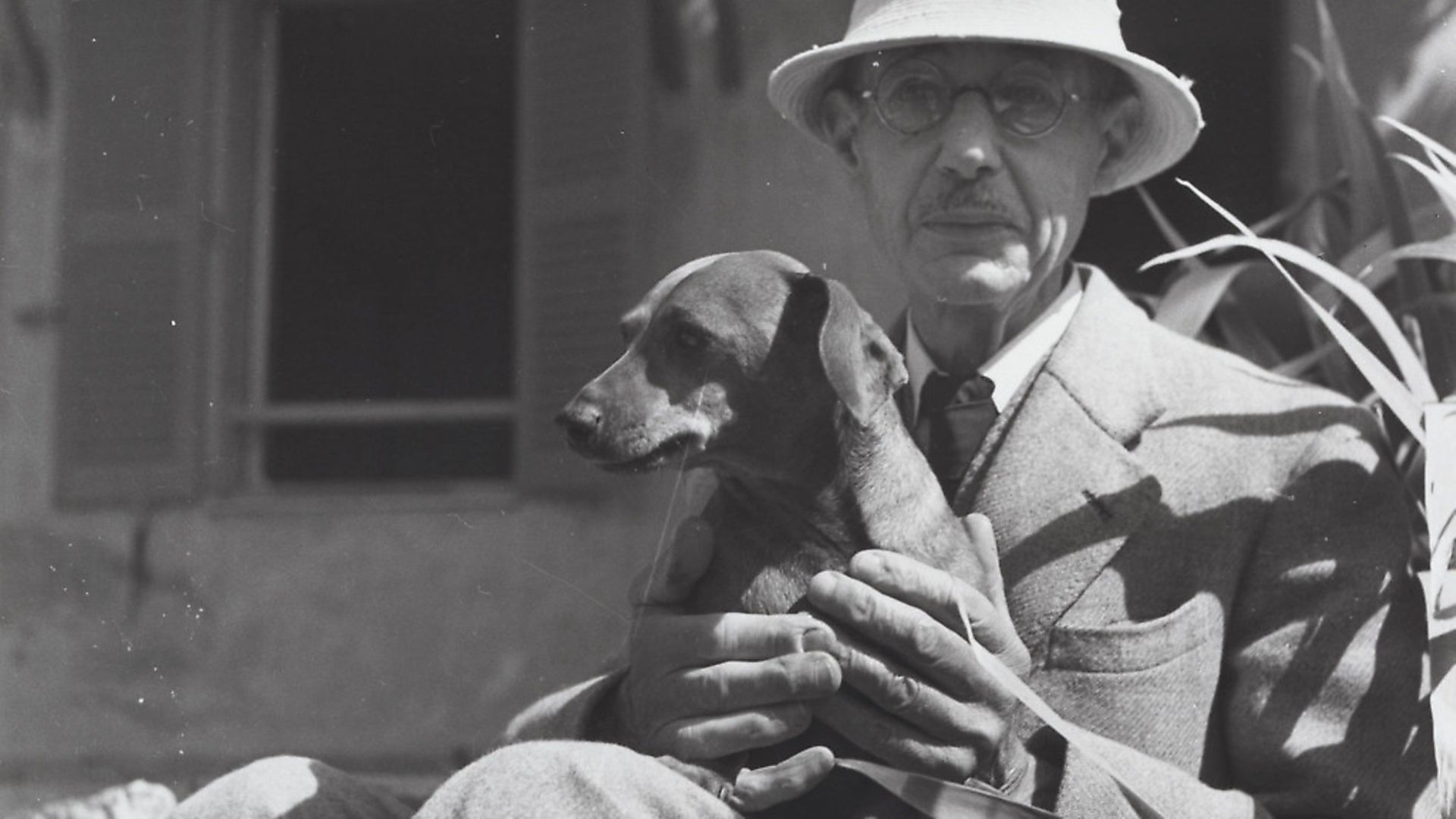 Artist Pierre Bonnard with daschund Poucette in 1941. Picture: Andre Ostier - Credit: Archant