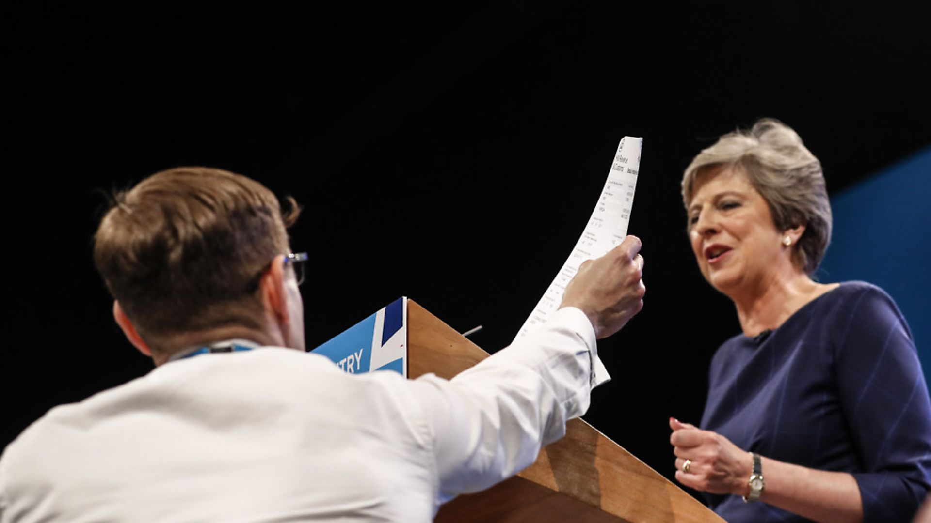 Theresa May is handed a P45 note during her conference speech in Manchester, Britain. (Xinhua/Han Yan) - Credit: Xinhua News Agency/PA Images