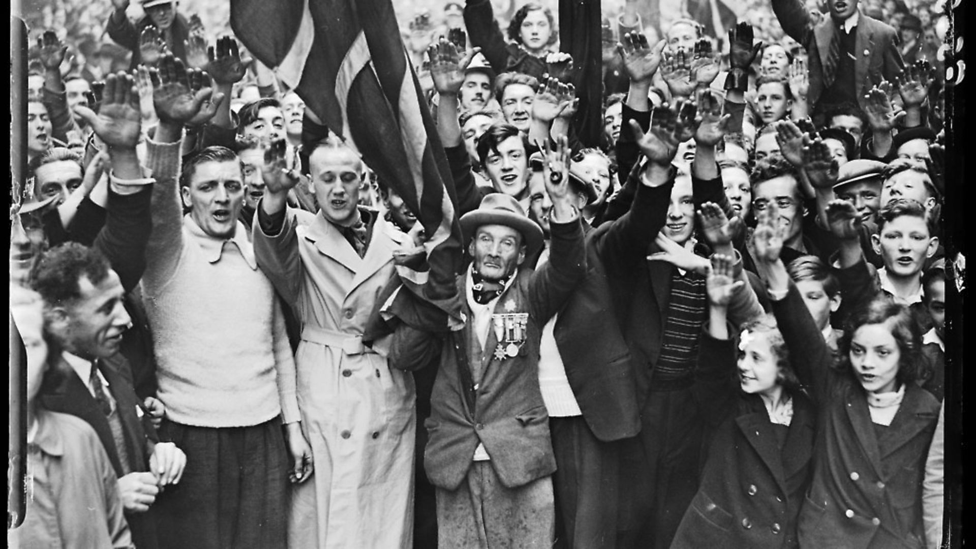 A crowd of fascist supporters in London giving the Nazi salute, October 1937. Picture: Getty Images - Credit: SSPL via Getty Images