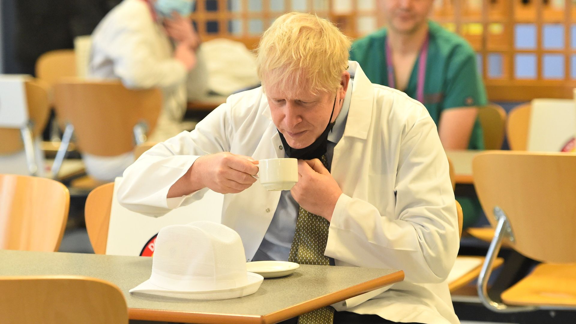 Prime Minister Boris Johnson drinking tea during a visit to Royal Berkshire Hospital, Reading - Credit: PA