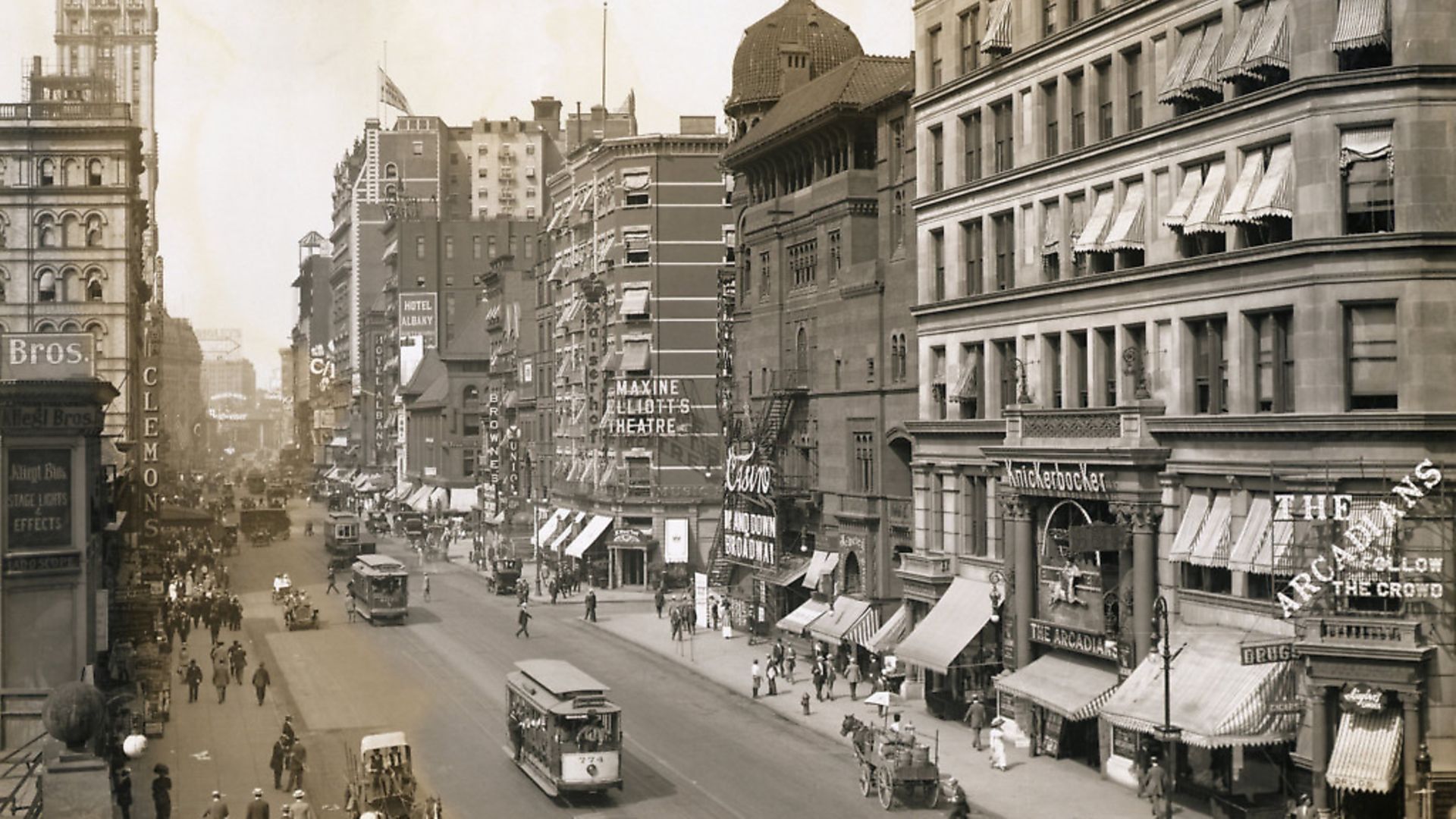 Carriages and Trolleys Along Broadway (Photo by �� Schenectady Museum; Hall of Electrical History Foundation/CORBIS/Corbis via Getty Images) - Credit: Corbis via Getty Images