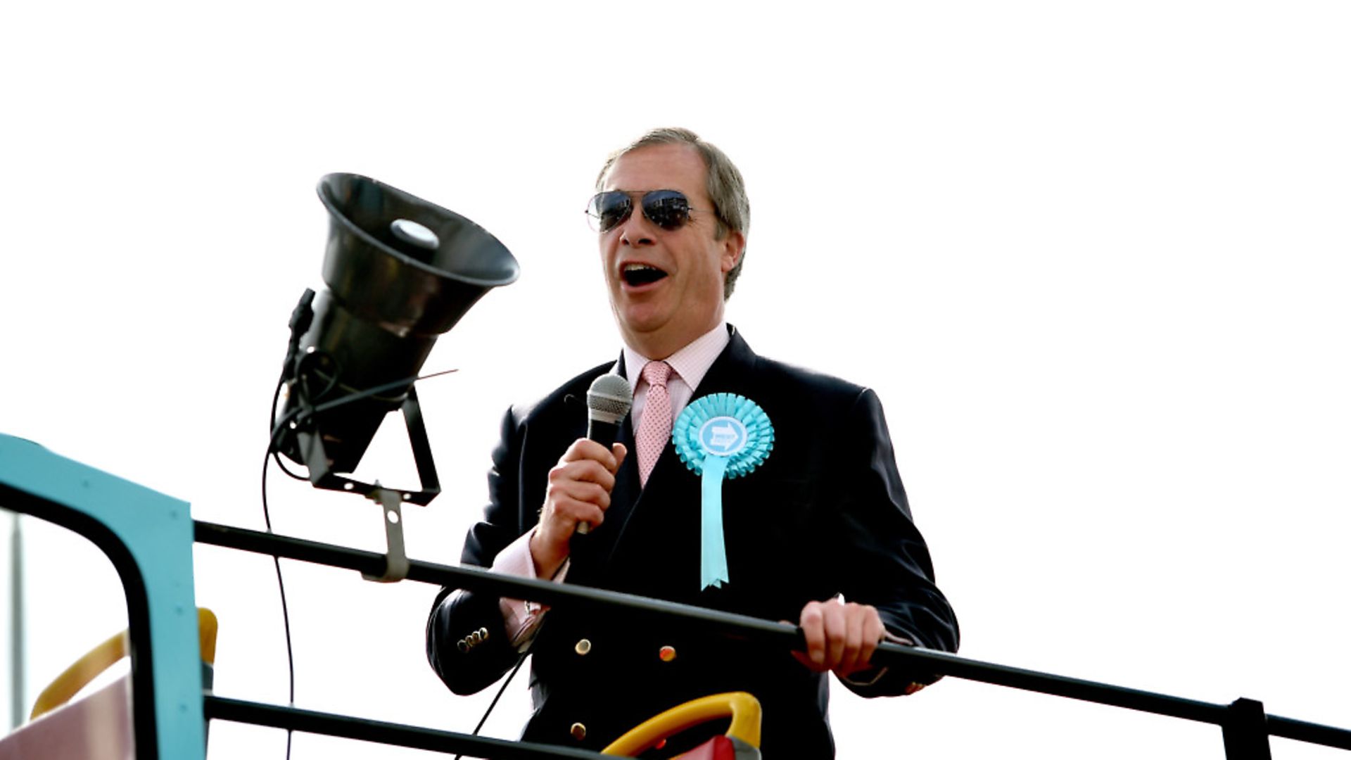 Brexit Party leader Nigel Farage on an open topped bus in South Ockendon (Joe Giddens/PA Wire) - Credit: PA