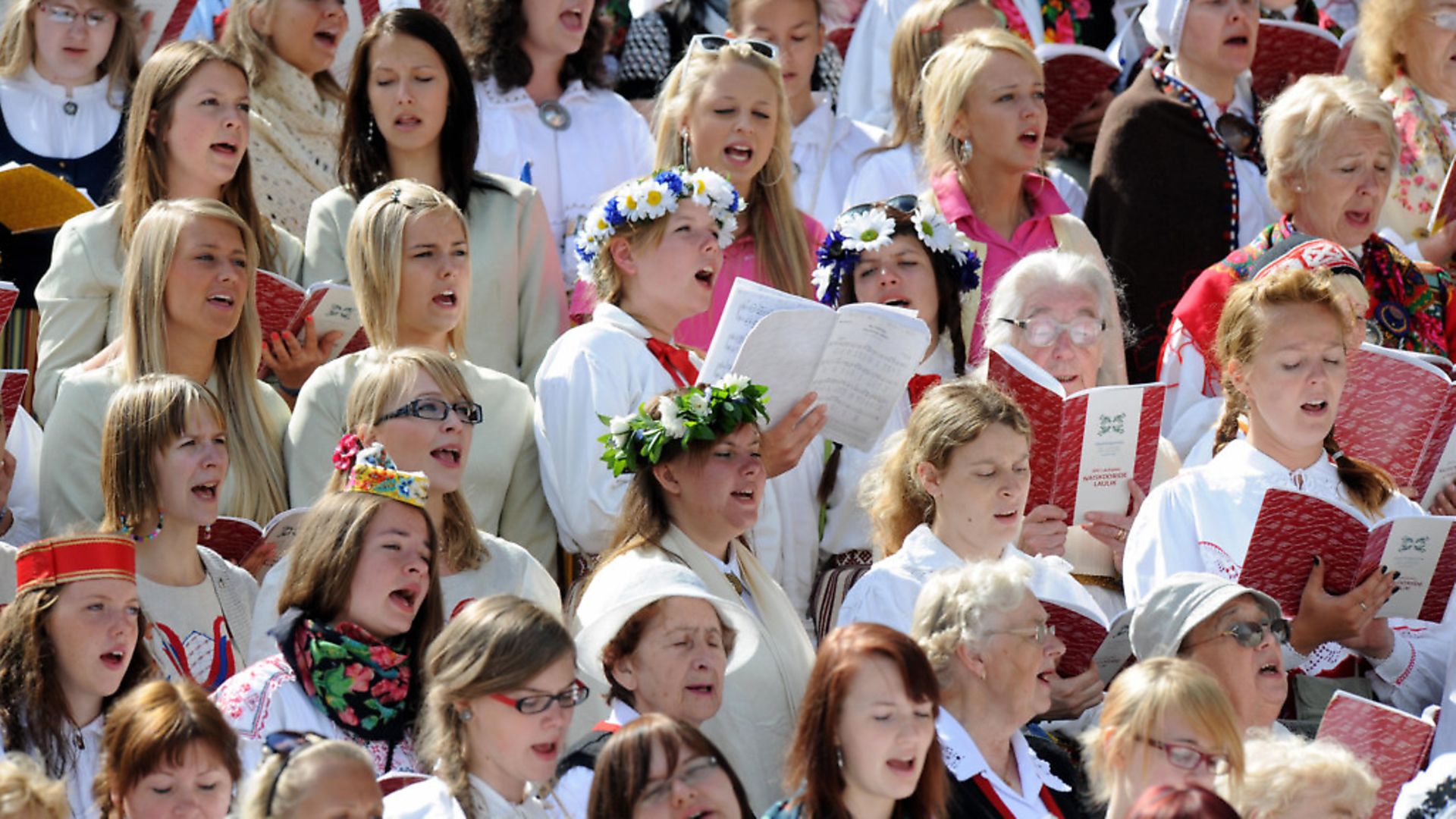 "To Breathe as One" festival in Tallinn reunits tens of thousands of Estonians that sing in huge choirs over the weekend as the Baltic nations host traditional song and dance festivals. (Photo: RAIGO PAJULA/AFP/Getty Images) - Credit: AFP/Getty Images