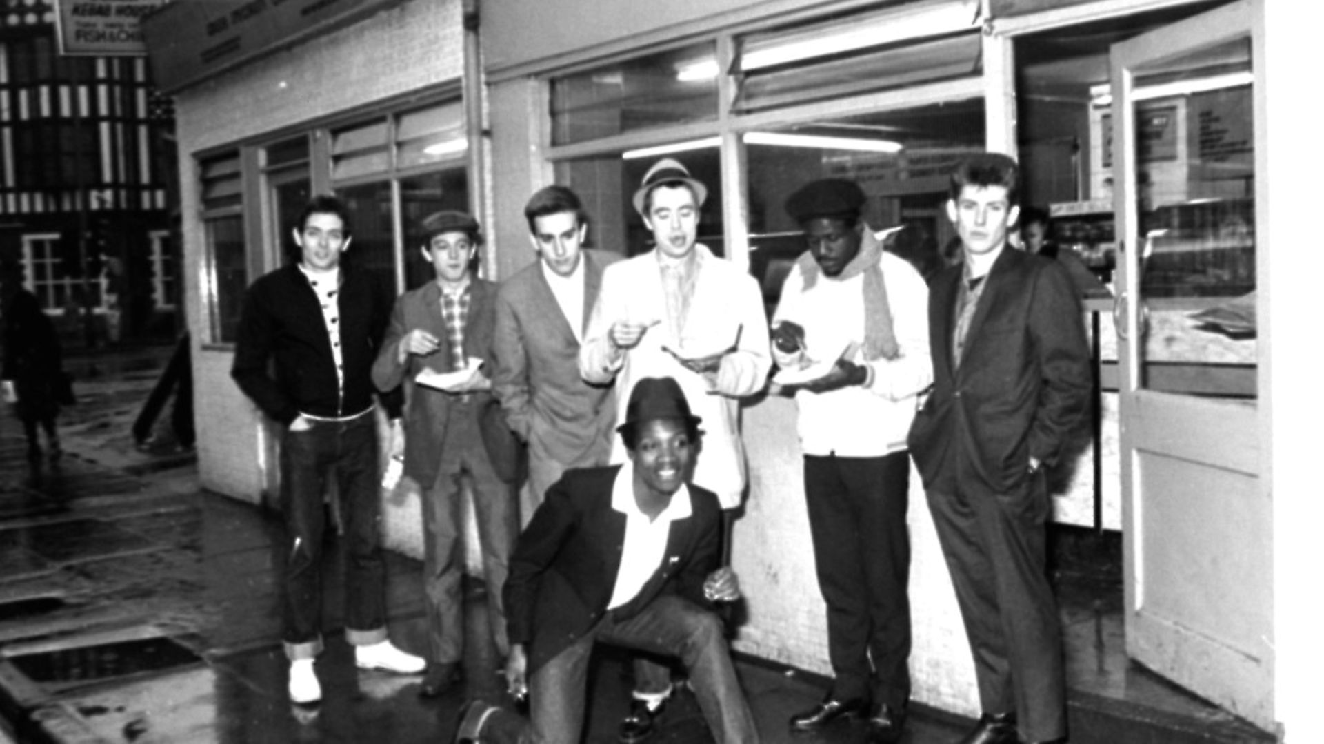 The Specials pop group in chip shop called 'The Parson's Nose' in Bishop Street, Coventry. Photo: John Potter/Mirrorpix/Getty Images - Credit: Getty Images