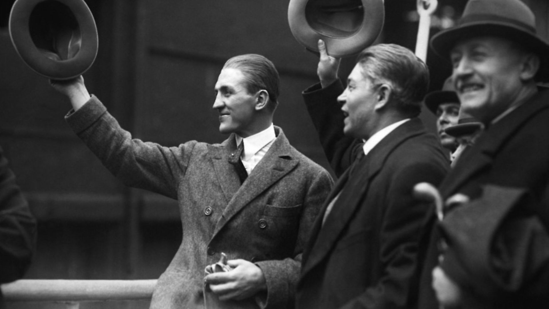 Georges Carpentier and his manager Francis Descamps greeting the crowd on their arrival on the liner 'La Savoie' in the port of New York City, United States. (Photo by KEYSTONE-FRANCE/Gamma-Rapho via Getty Images) - Credit: Gamma-Keystone via Getty Images