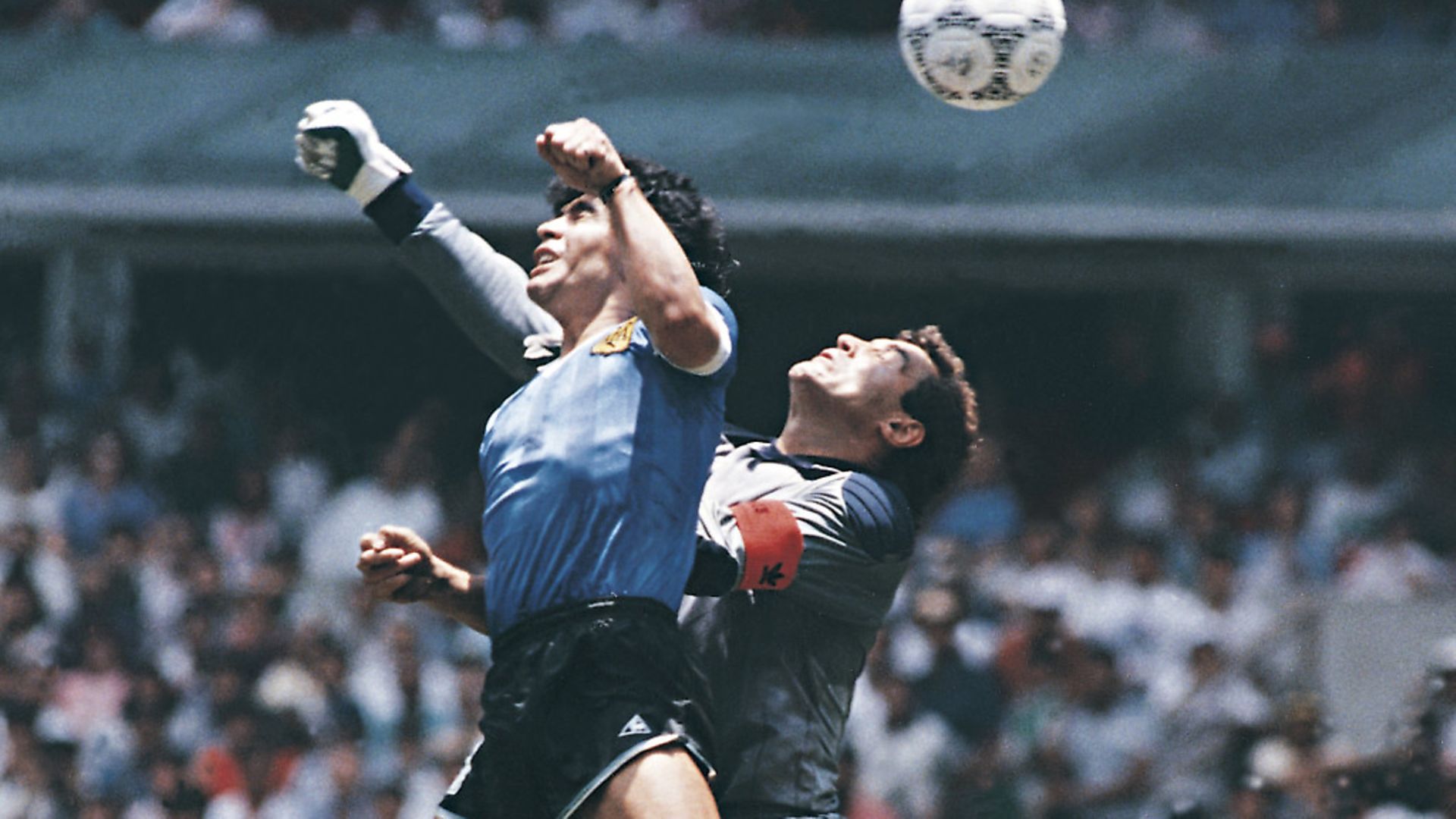 Diego Maradona uses 'the hand of God'. Photo by Archivo El Grafico/Getty Images - Credit: Getty Images