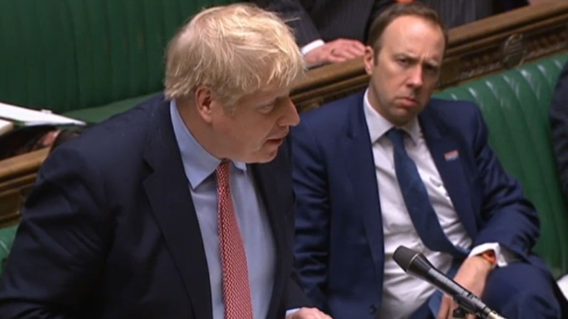 Boris Johnson speaks in the House of Commons next to Matt Hancock - Credit: Jessica Taylor/UK Parliament