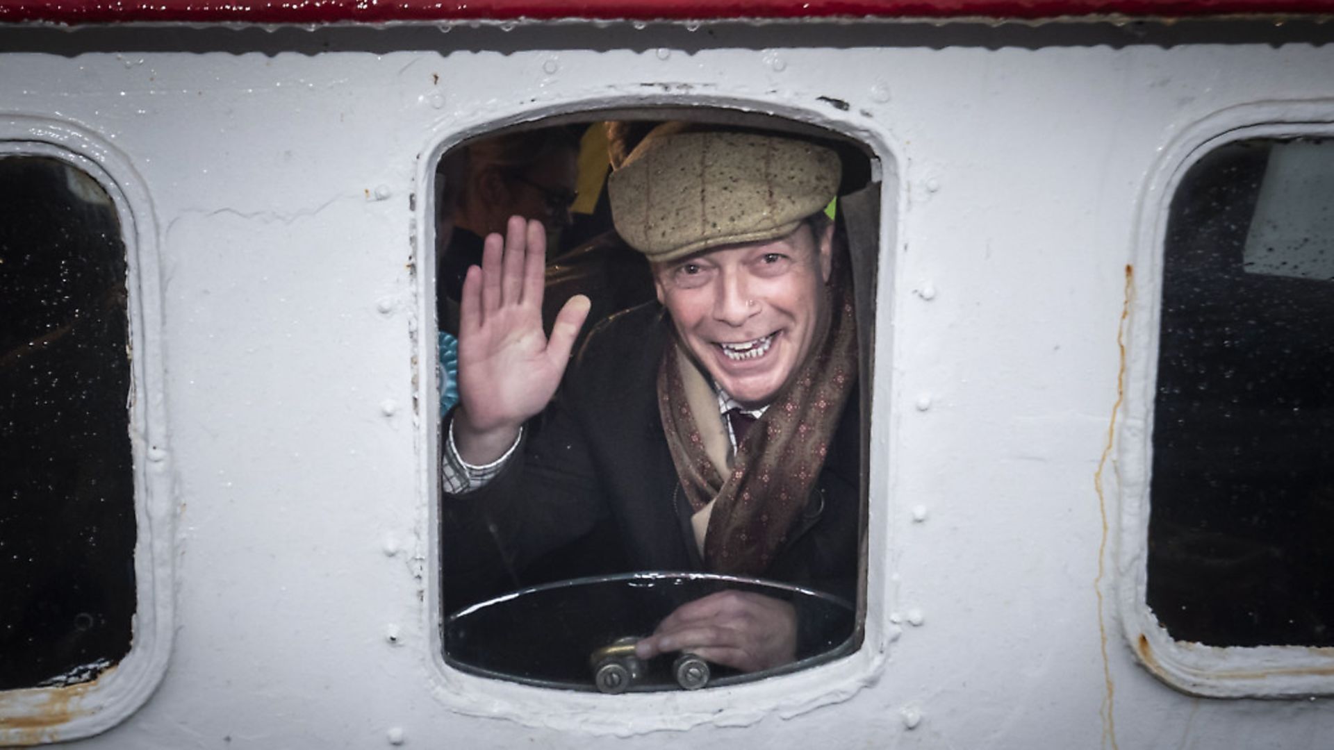 Brexit Party leader Nigel Farage looks out from a window on the Kestrel crabbing boat in Grimsby. Photograph: Danny Lawson/PA Wire. - Credit: PA