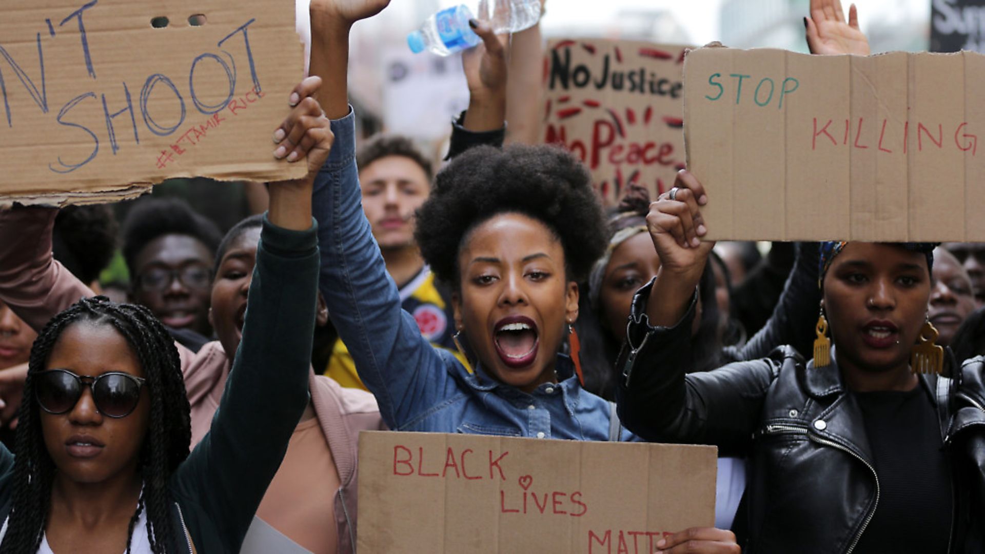 TOPSHOT - Demonstrators from the Black Lives Matter movement march through central London on July 10, 2016, during a demonstration against the killing of black men by police in the US. 
Police arrested scores of people in demonstrations overnight Saturday to Sunday in several US cities, as racial tensions simmer over the killing of black men by police. / AFP / DANIEL LEAL-OLIVAS        (Photo credit should read DANIEL LEAL-OLIVAS/AFP via Getty Images) - Credit: AFP via Getty Images