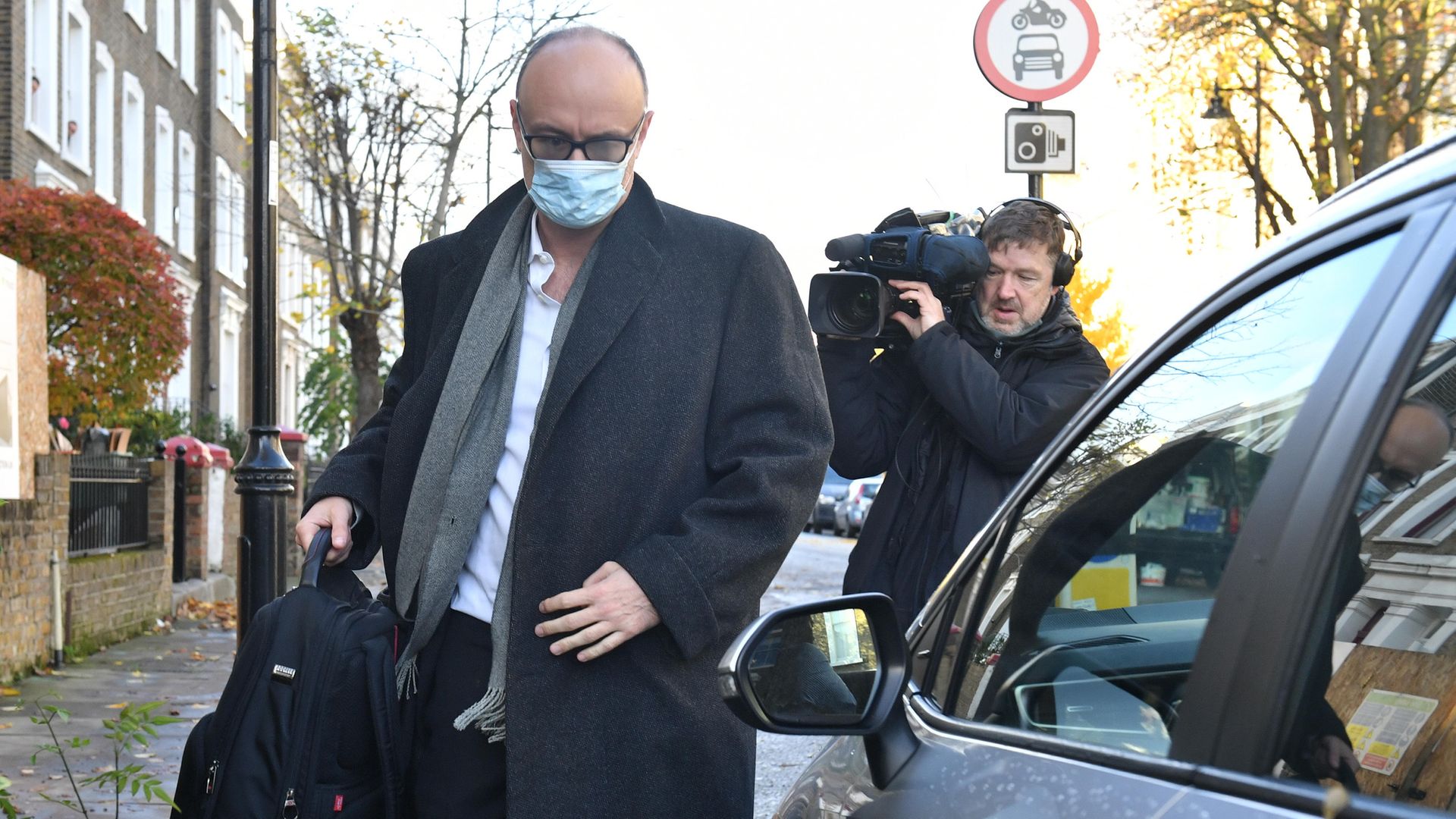 Prime minister Boris Johnson's top aide Dominic Cummings leaving his north London home - Credit: PA