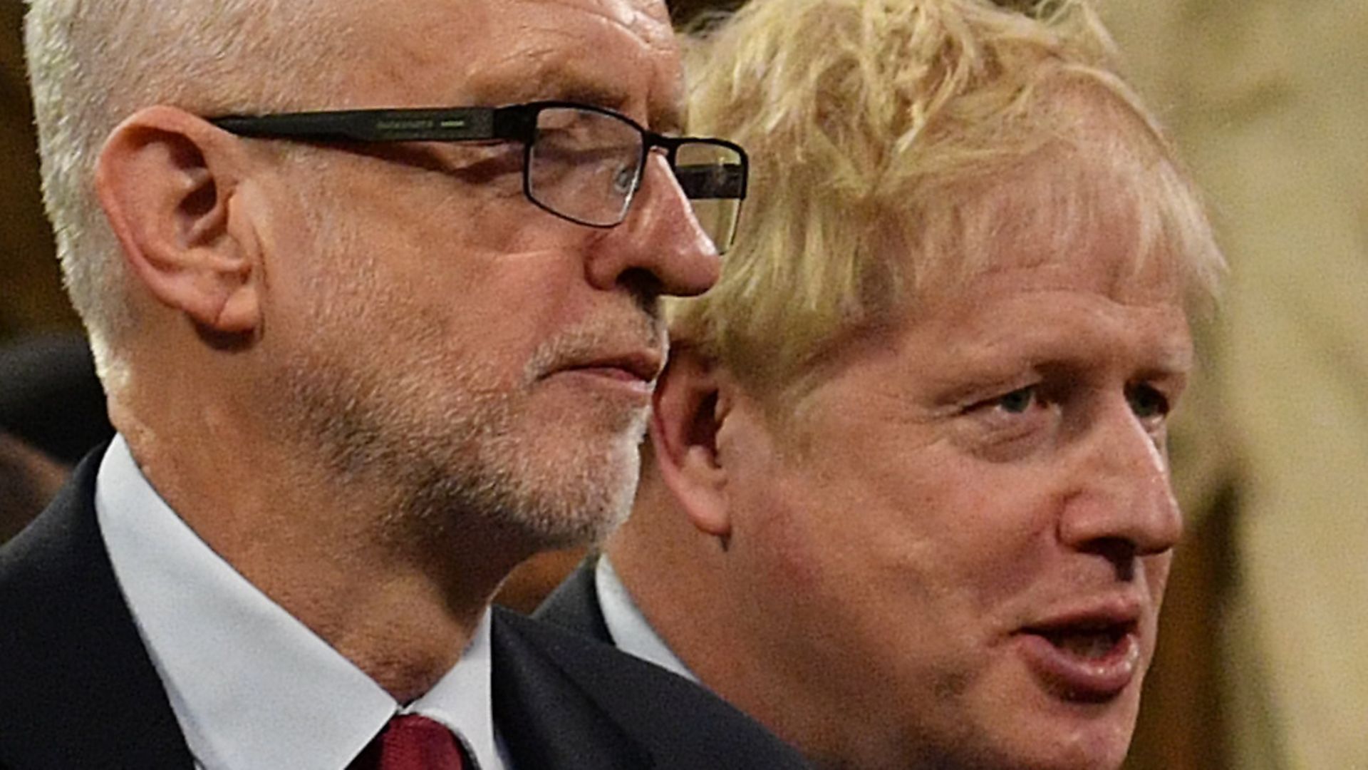 Prime Minister Boris Johnson (right) speaks with Labour Party leader Jeremy Corbyn in the Central Lobby as they walk back to the House of Commons after the Queen's Speech during the State Opening of Parliament ceremony in London. Picture: Daniel Leal-Olivas - Credit: PA Wire/PA Images