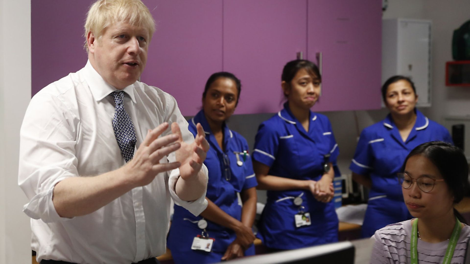 Boris Johnson speaks to nurses during a visit to the East Midlands and East of England Genomic Laboratory Hub at Addenbrooke's Hospital in Cambridge. Photograph: Alastair Grant/PA. - Credit: PA Wire/PA Images