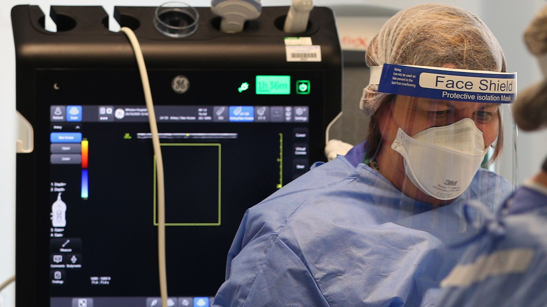 Health workers wearing full personal protective equipment (PPE) on the intensive care unit (ICU) at Whiston Hospital in Merseyside as they continue deal with the increasing number of coronavirus patients - Credit: PA