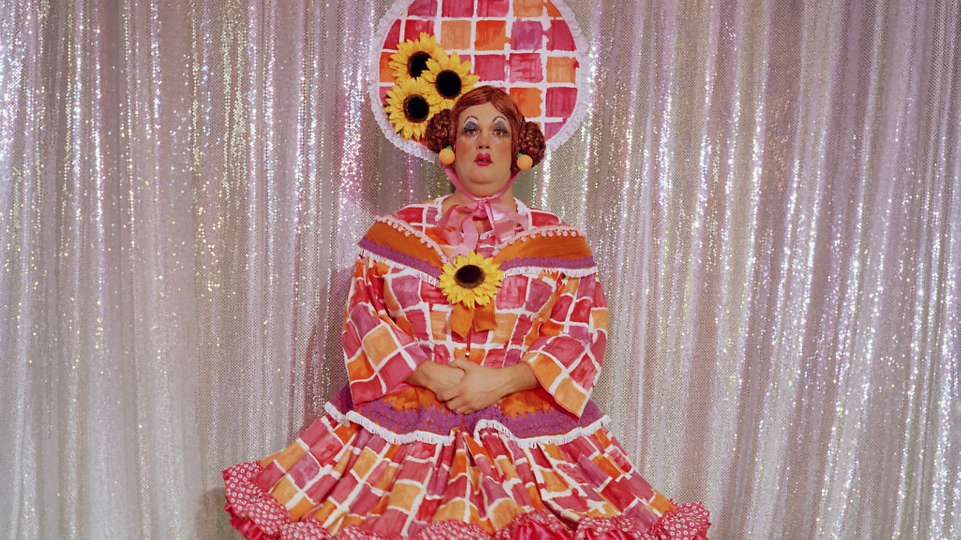Mark Hudson, aged 37, has been playing the role of a pantomime dame every year for the last 16 years. This year he is playing the role of Cynthia Trott in a production of Jack and the Beanstalk at the Gorleston Pavilion Theatre, near Great Yarmouth. The venue is a remarkable old Edwardian seaside "music hall" theatre. He is the principal of a theatre school in Norwich. "I put my own make up on as I know how my face works: it is an animated character of its own - all eyebrows and lips. It is also the time when you find your character. I do not know many straight dames in the business. Gay men are often more creative and that naturally comes out in a dame as they can see both sides of the part. As a dame you have to be a good comedian, you have to understand pathos, you have to connect with all the elements of your audience and they are very diverse." (Photo by Gideon Mendel/Corbis via Getty Images) - Credit: Corbis via Getty Images