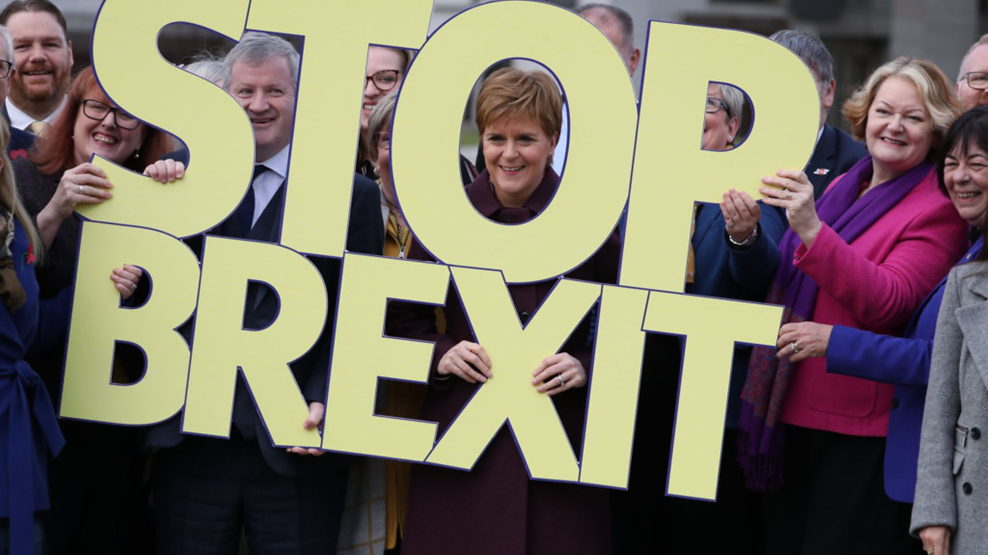 Scottish National Party Westminster leader Ian Blackford (centre left) and Nicola Sturgeon (centre) at the last general election - Credit: PA Wire/PA Images