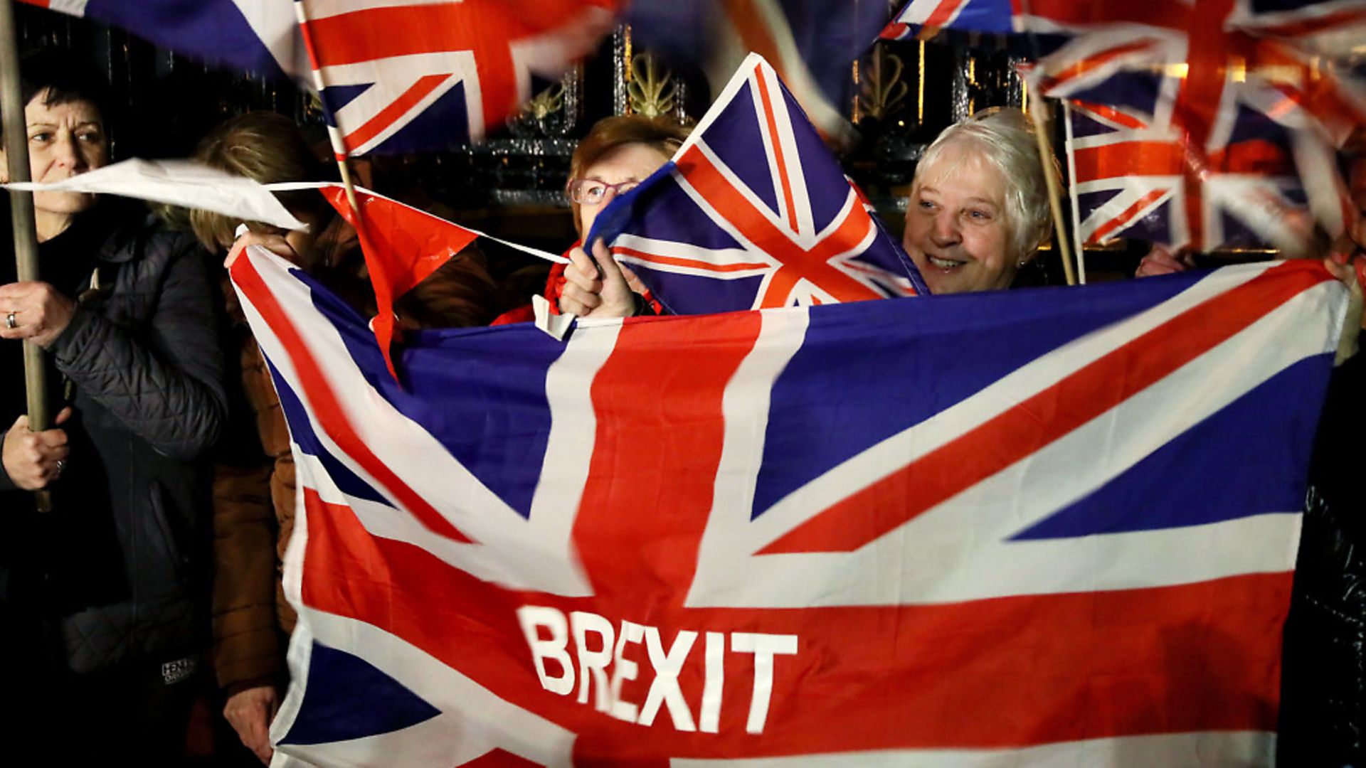 Pro-Brexit supporters gather to celebrate as the UK prepares to leave the European Union. Photograph: United Kingdom/PA. - Credit: PA