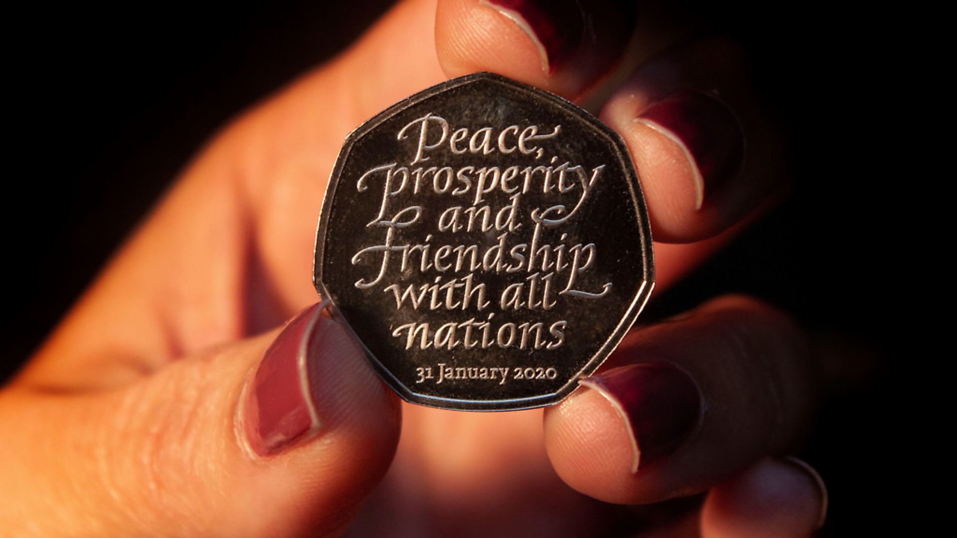 The Brexit coin, a 50p bearing the inscription 'Peace, prosperity and friendship with all nations' and the date the UK leaves the EU.  Photograph: HM Treasury/PA. - Credit: PA