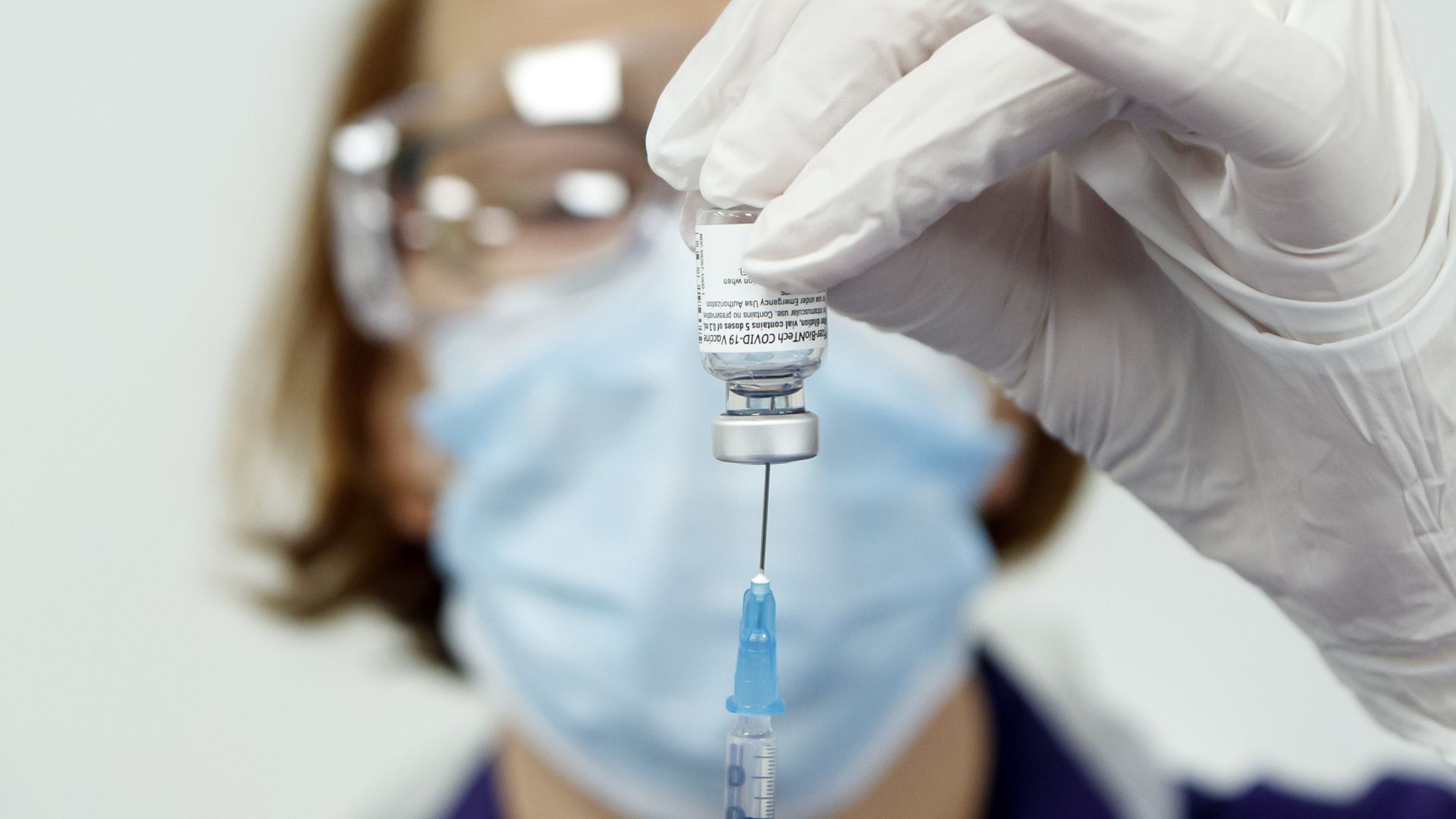 Nurse Pat Sugden prepares the Pfizer-BioNTech vaccine at the Thackray Museum of Medicine in Leeds, the first UK museum to host a COVID-19 vaccination centre, as BioNTech boss Ugur Sahin says he is confident vaccine will work on UK variant. - Credit: PA