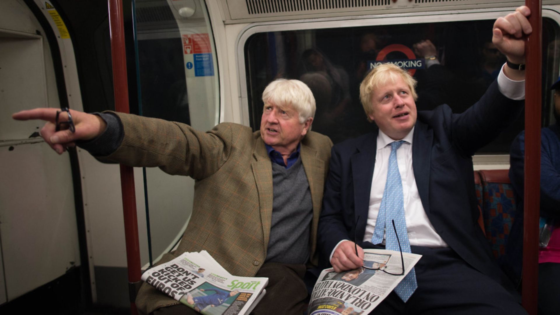 Boris Johnson sits next to his father Stanley (left) on the Bakerloo Line - Credit: PA