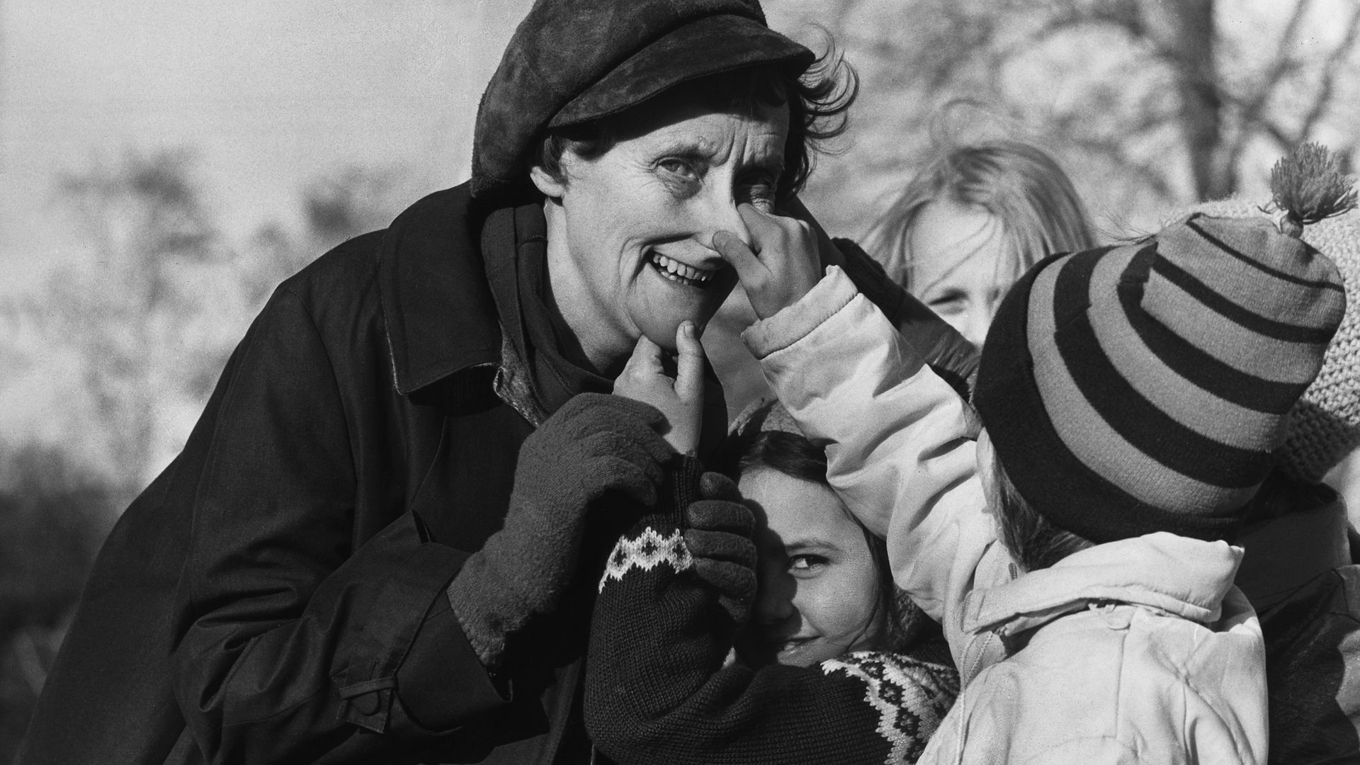 Author Astrid Lindgren has her nose pulled by a young fan - Credit: ullstein bild via Getty Images