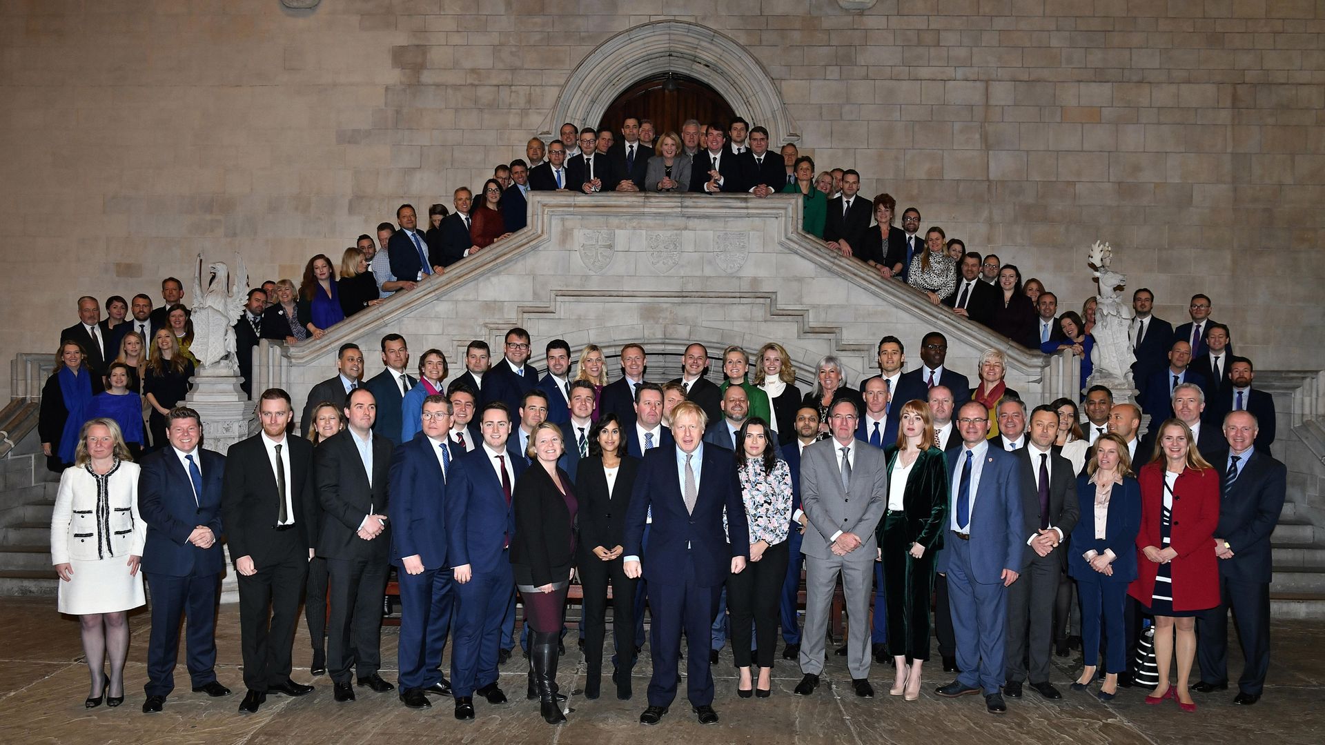 Boris Johnson alongside newly elected Conservative MPs at the Houses of Parliament in Westminster - Credit: PA