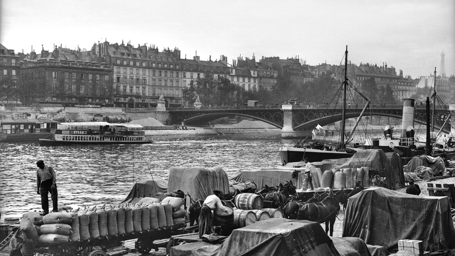 A photograph from around 1890 showing the stretch of the Seine where the body of the unidentified woman was recovered from the water - Credit: Roger Viollet via Getty Images