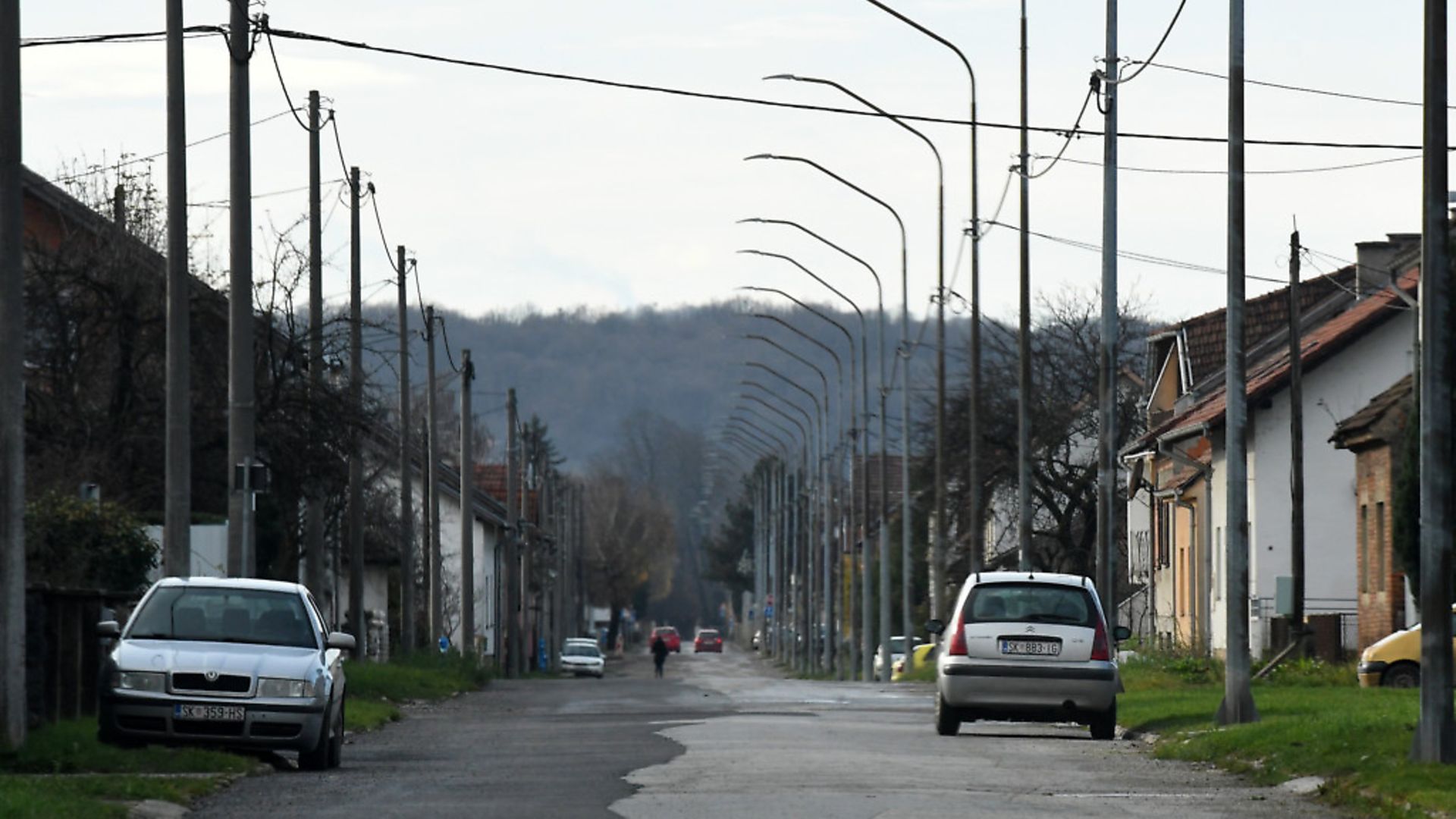 An empty street in the small town of Petrinja, some 60 kilometers southeast of Zagreb, where one out of eight people have left in the past decade. Photo by Denis LOVROVIC / AFP / Getty Images - Credit: AFP via Getty Images
