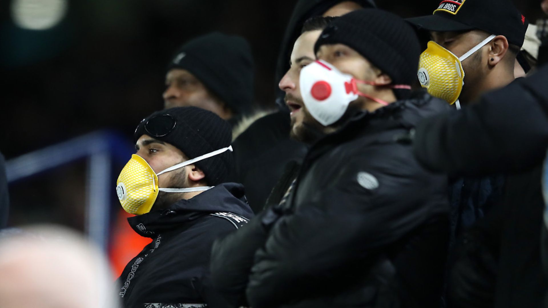 Fans wear face masks during the FA Cup Fifth Round match between Leicester City and Birmingham City at The King Power Stadium. Picture: Alex Pantling/Getty Images - Credit: Getty Images