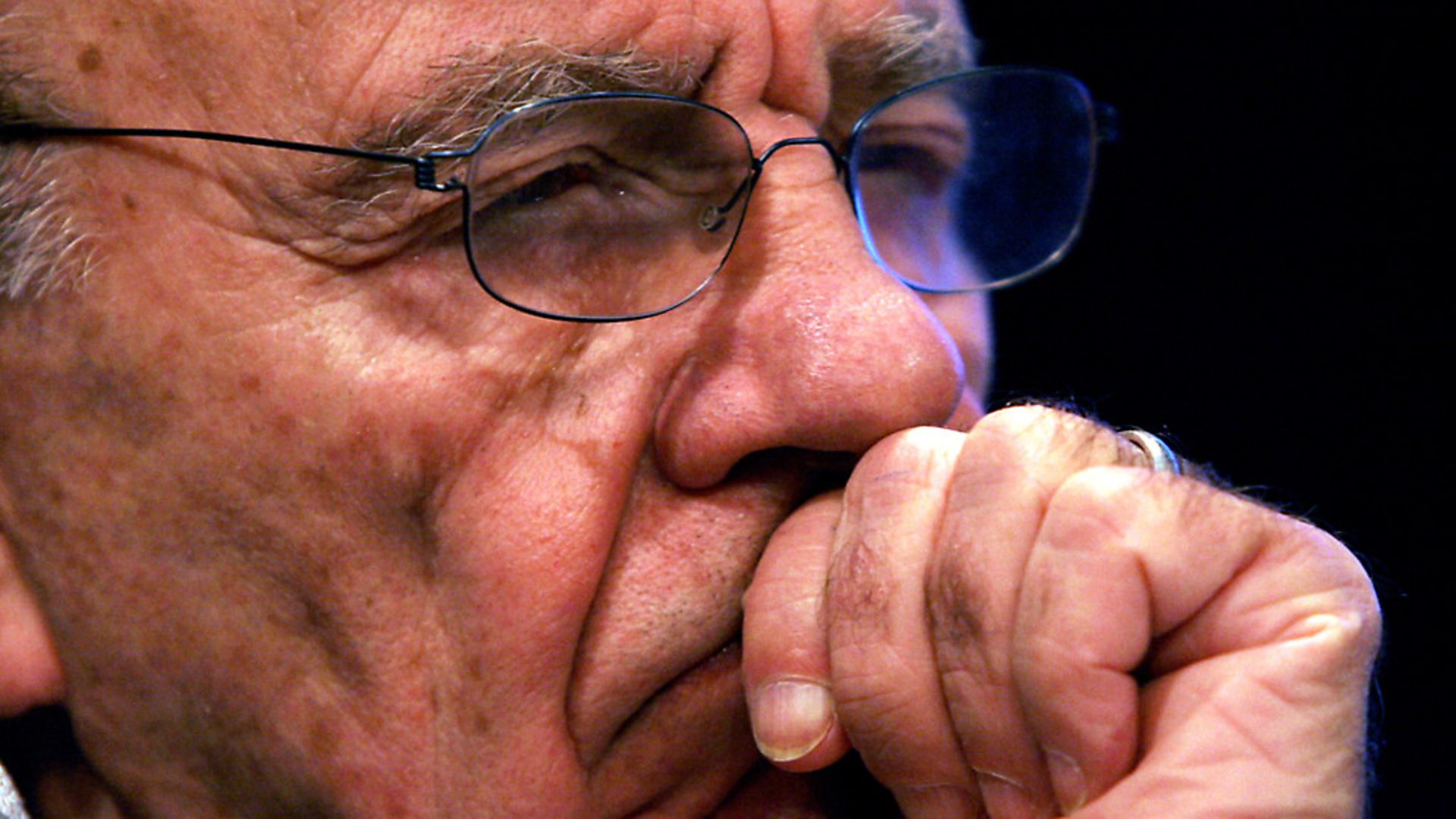 Rupert Murdoch listens to a gathering of reporters immediately following a shareholder meeting. (AP Photo/Bebeto Matthews) - Credit: AP/Press Association Images