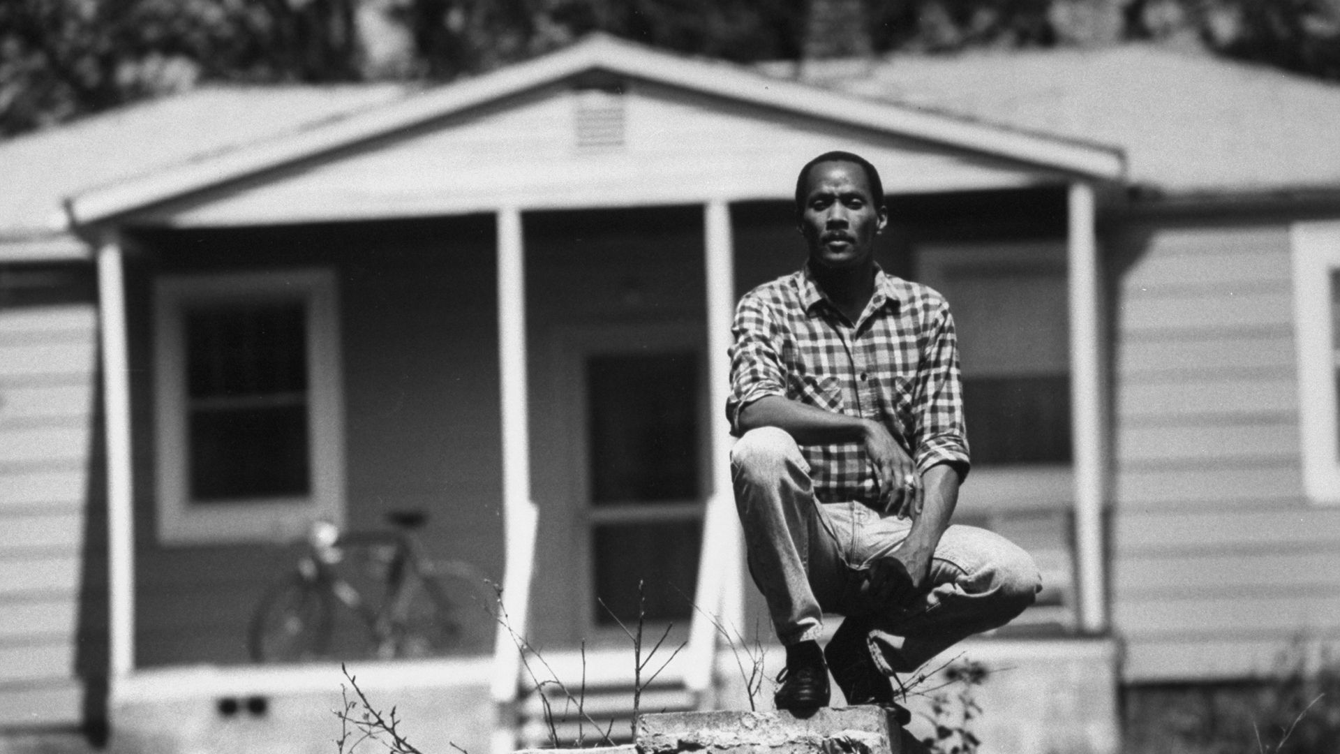 Frank Wills in front of his mother's home - Credit: The LIFE Images Collection via G