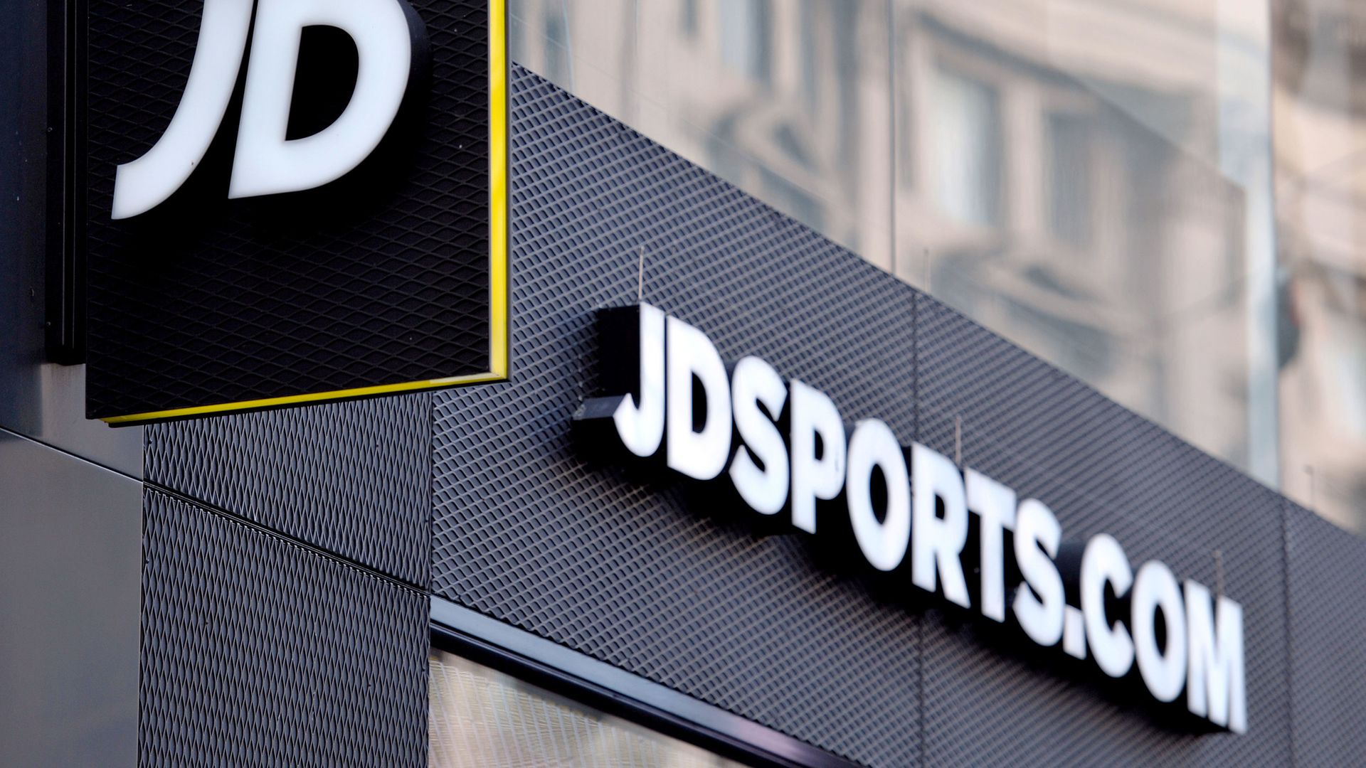 A shop sign for JD Sports in central London - Credit: PA