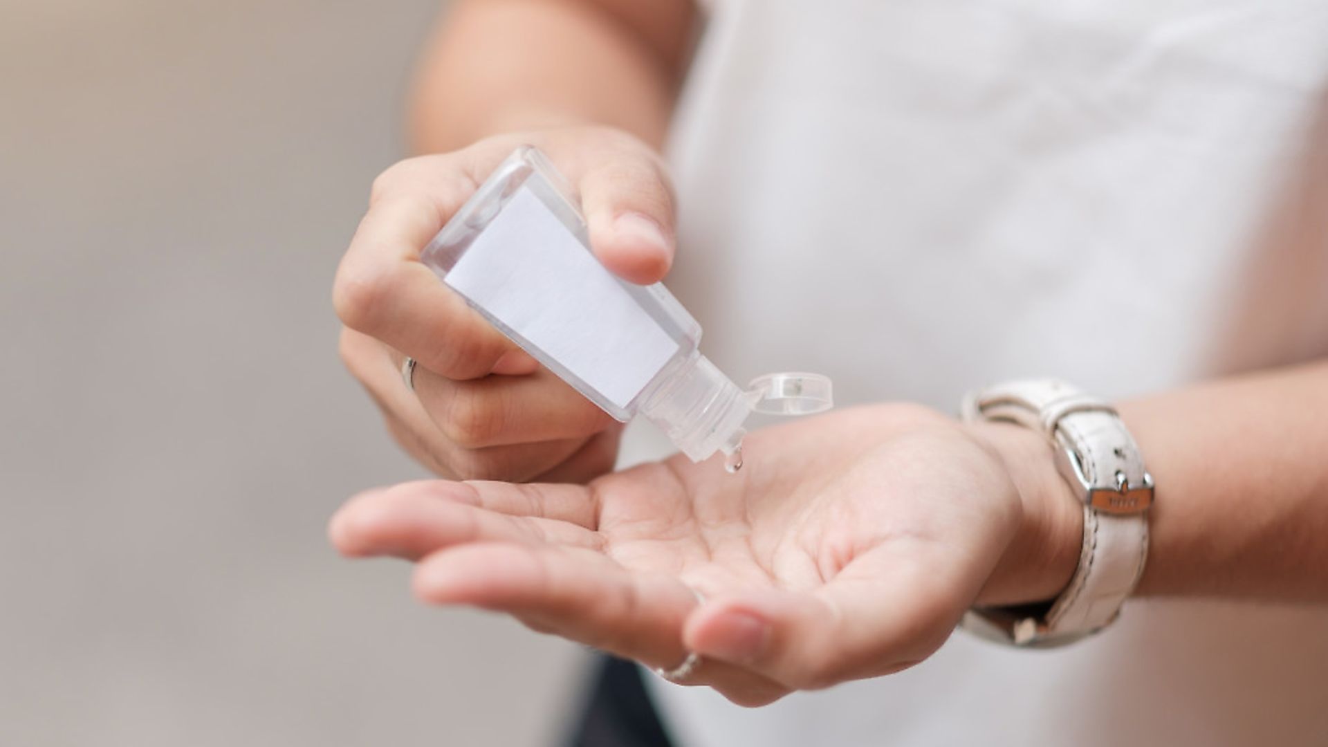 Woman hands using wash hand sanitiser gel dispenser. Picture: Getty Images/iStockphoto/Panuwat Dangsungnoen. - Credit: Getty Images/iStockphoto