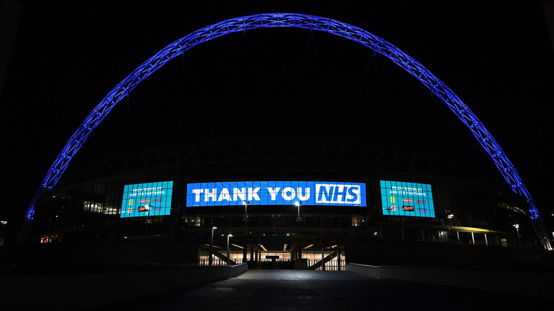 Wembley Arch is illuminated in blue to show its appreciation to the NHS amid the coronavirus outbreak in London. Photograph: Kirsty O' Connor/PA Wire. - Credit: PA