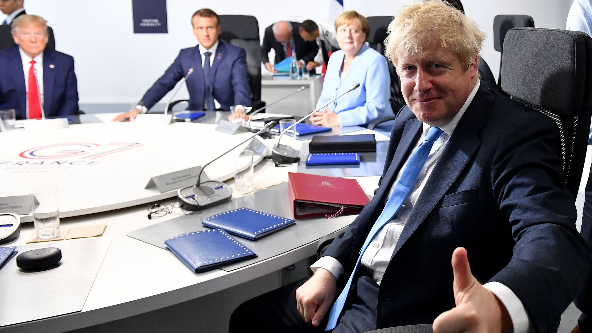 Boris Johnson at a meeting of the G7 alongside Angela Merkel, Emmanuel Macron and Donald Trump - Credit: PA